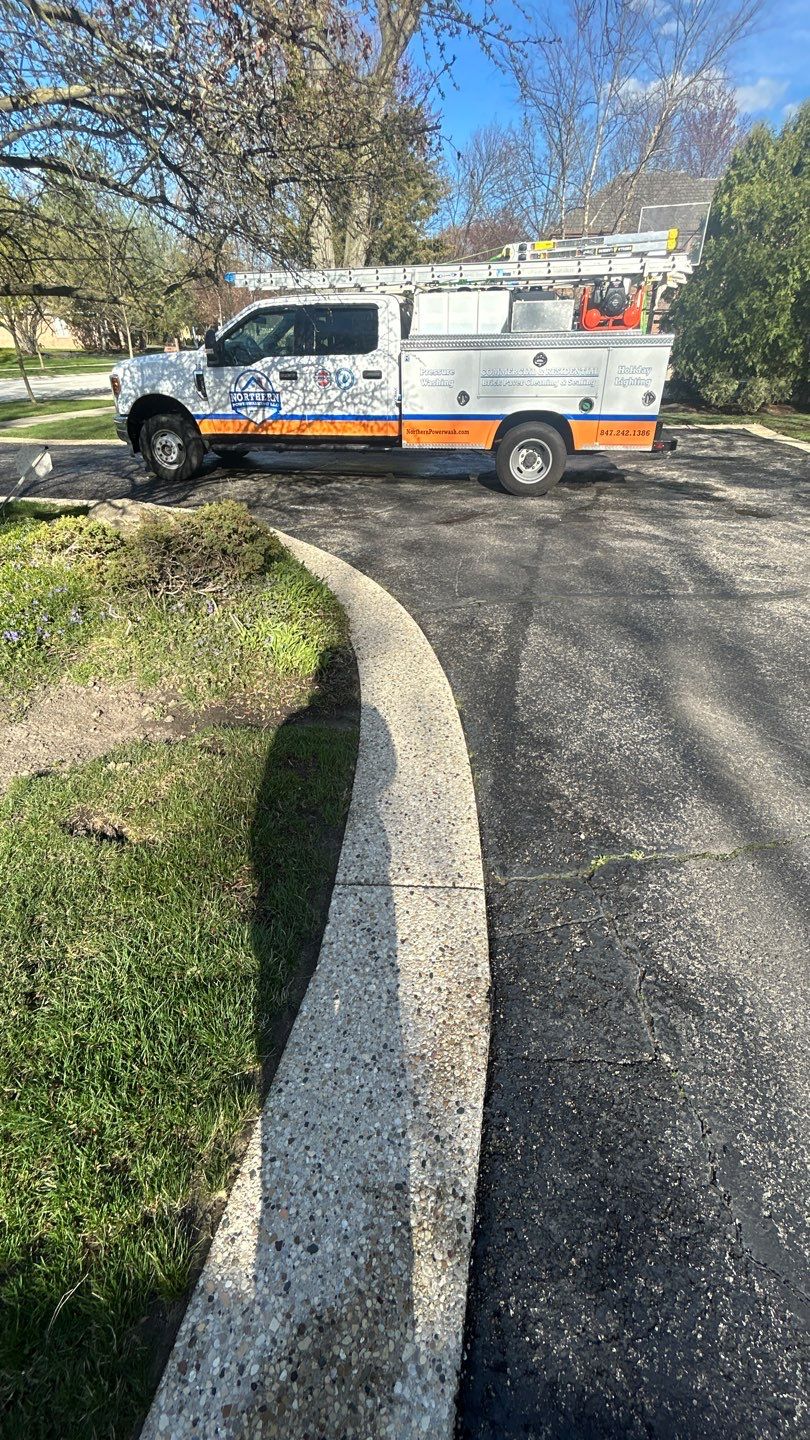 Aggregate Clean and seal using low gloss sealer by Northern Power Washing LLC.