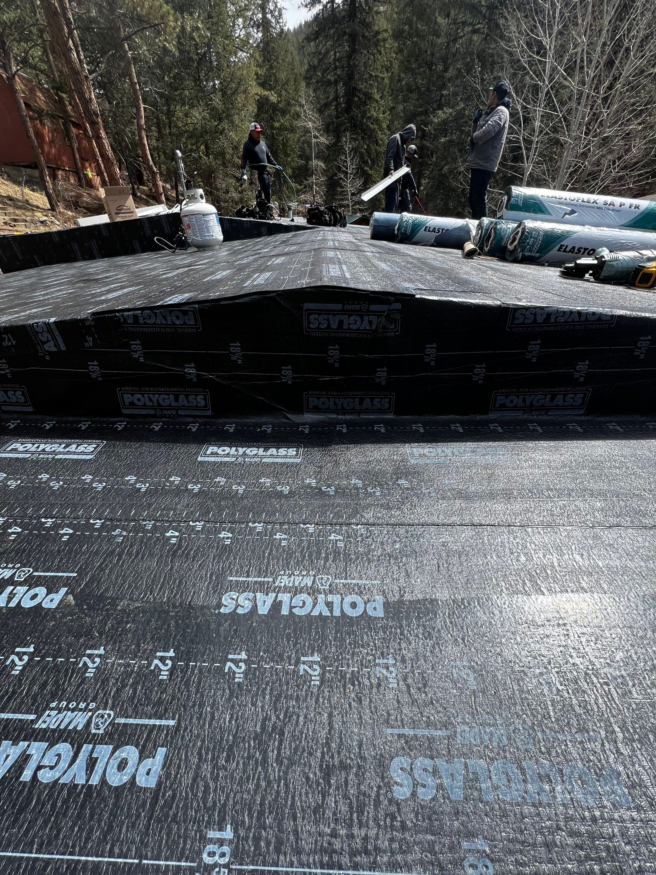 Residential Roofing Installation using Modified Bitumen Roofing by Blue Peaks Roofing LLC 