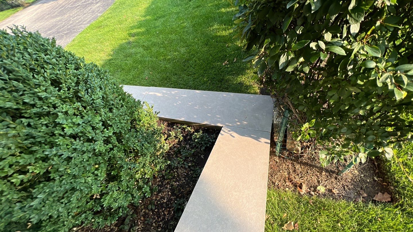 marble patio cleaning and sanding using Polysweep polymeric sand by Northern Power Washing LLC.