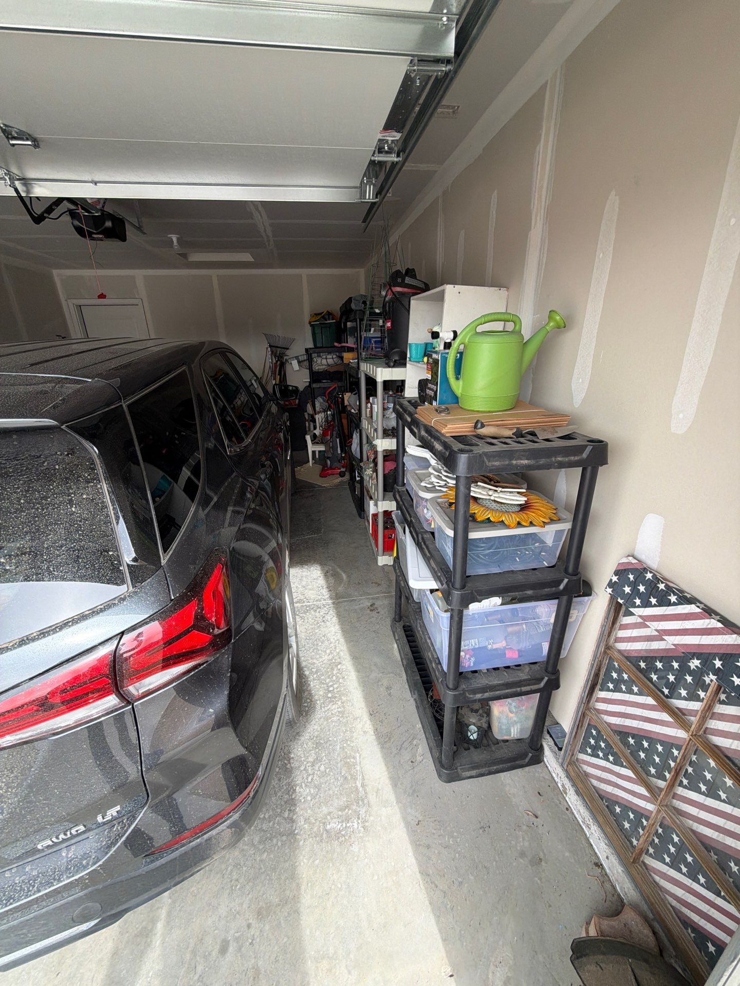 Custom Epoxy Garage Floor Coating Installation in Sioux Falls by Select Painting, Coatings & Garage Cabinets