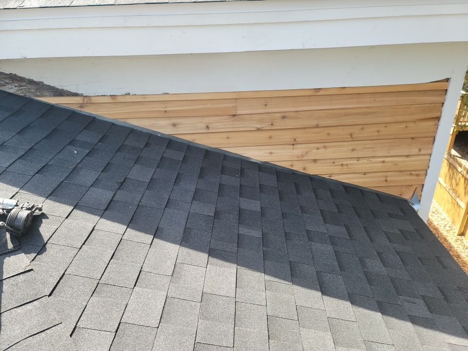 Residential Roofing Installation using Roof Replacement by American Roofing & Construction LLC