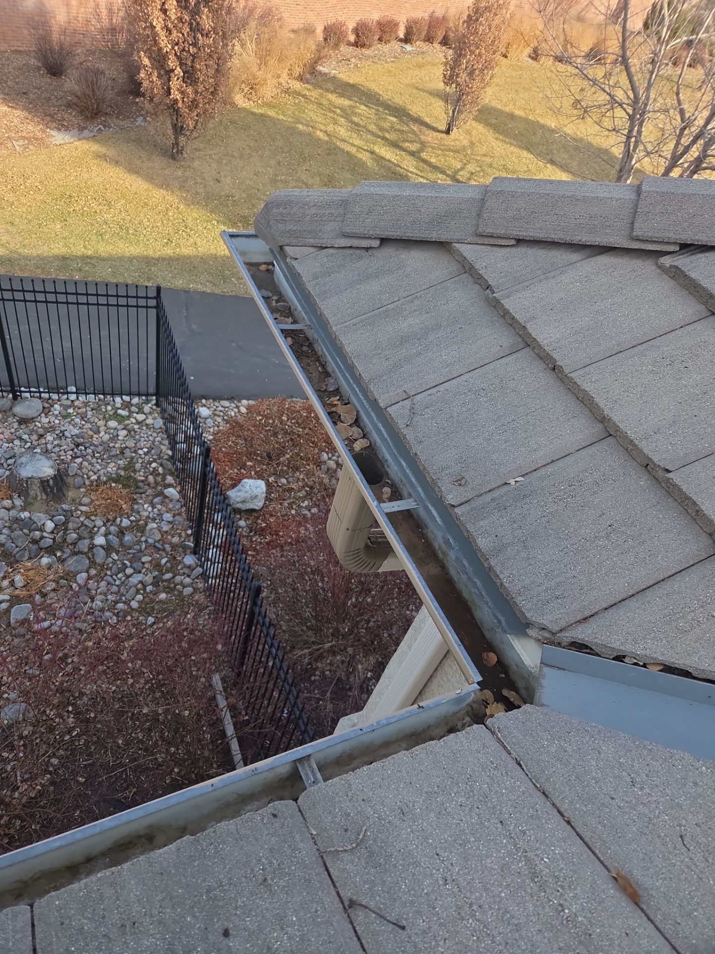 Gutters and Downspout Cleaning by RTP Roofing Company