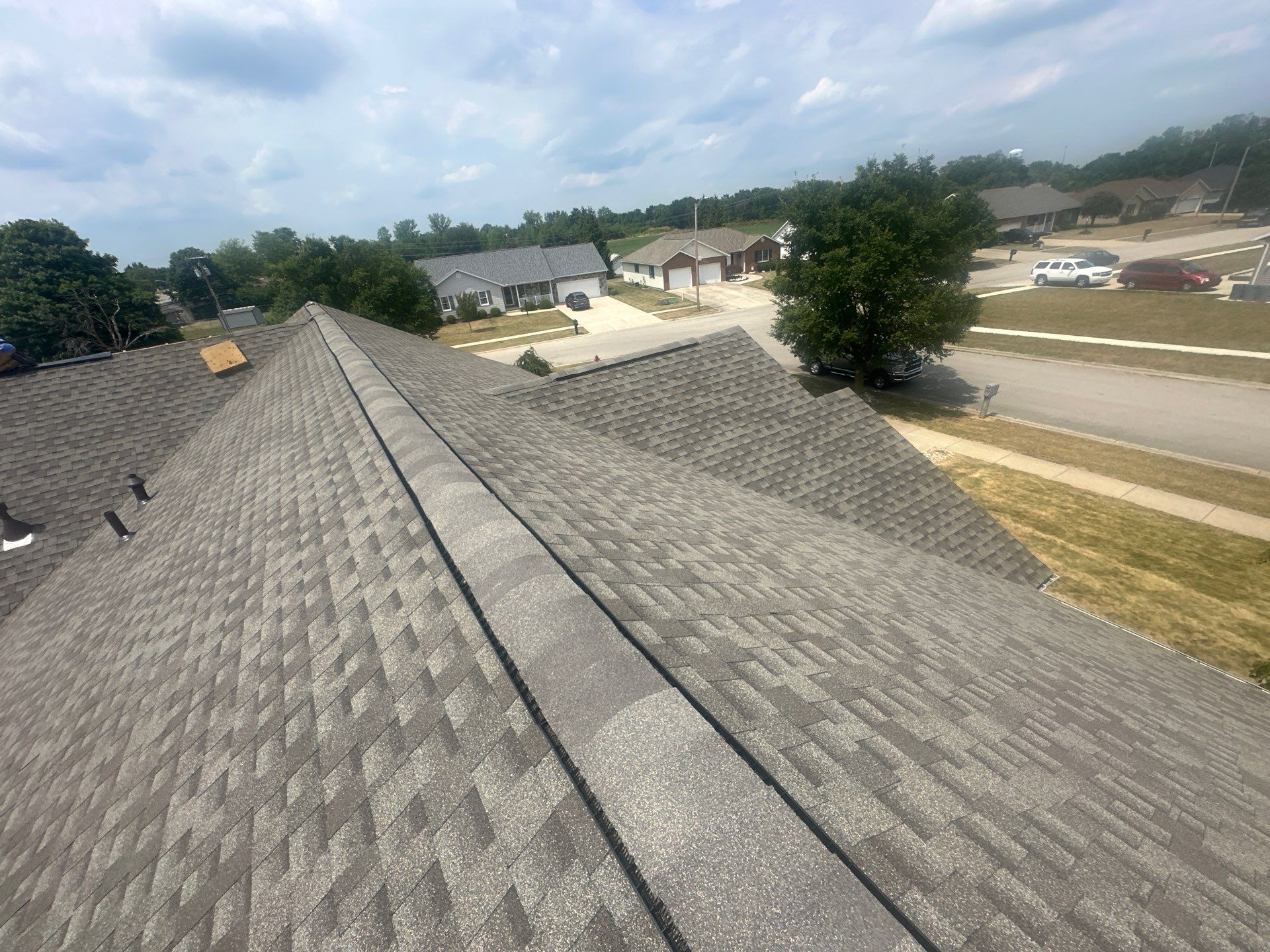 Residential Roofing Installation using Timberline HDZ Shingles - Weathered Wood by RoofX 