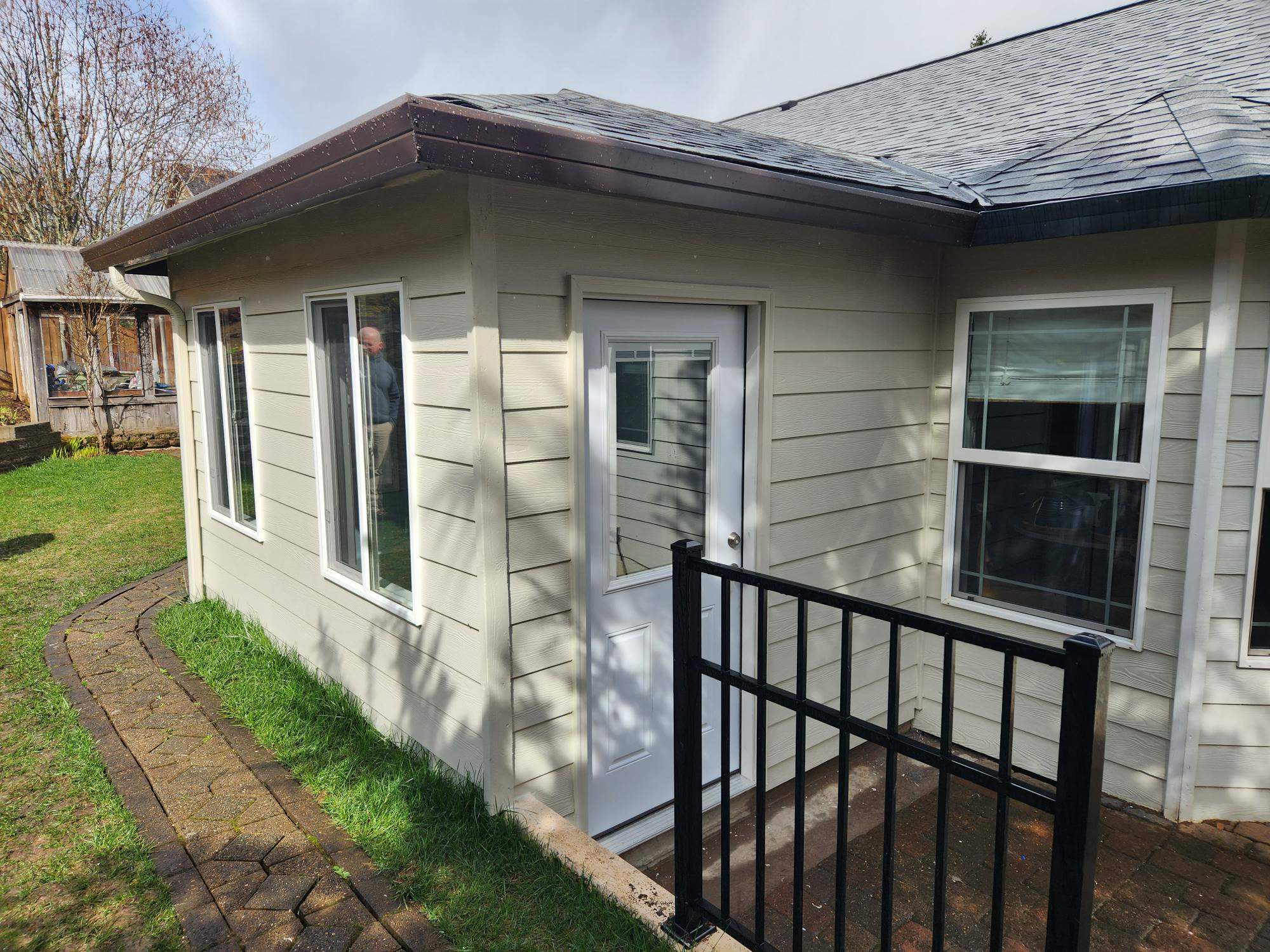 Custom Sun Room Addition and Exterior Renovation in Oregon City by American Made Construction 