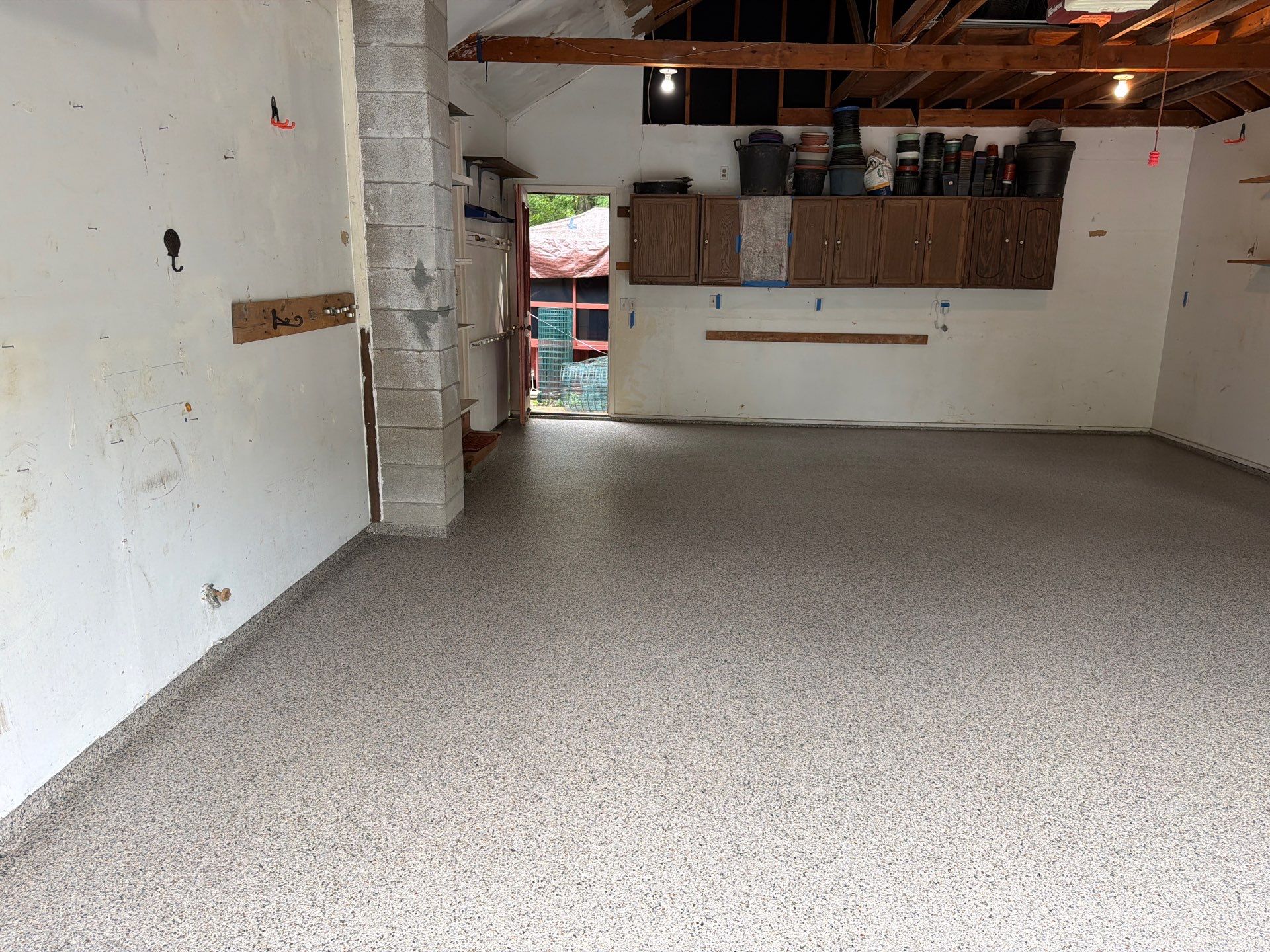 Vintage Goldmine Garage Coating by NG Masonry & Construction LLC
