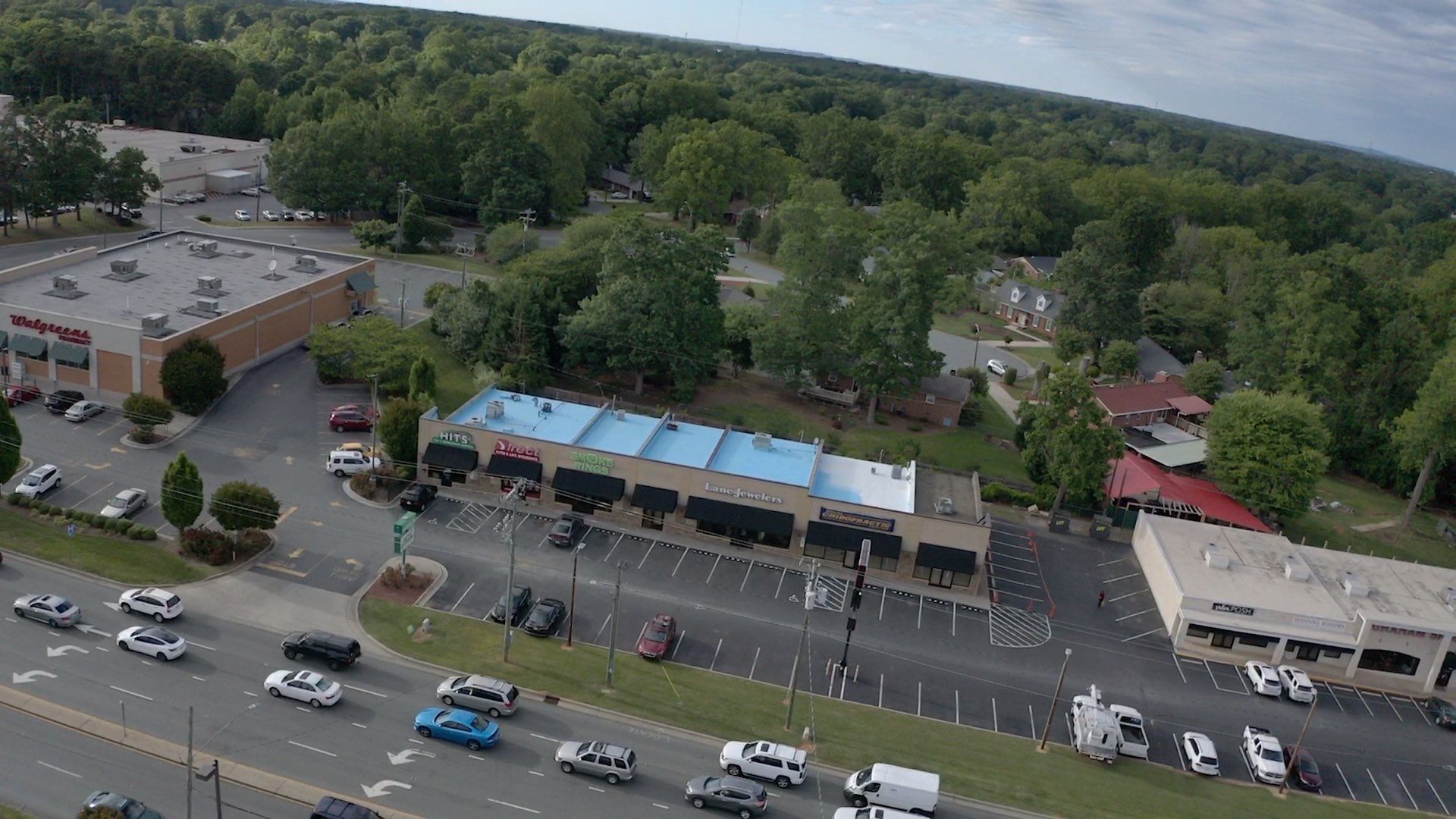 Commercial Roof Coating using Fiberseal basecoat and Silicon Topcoat by Just In Time Roofing and Restoration