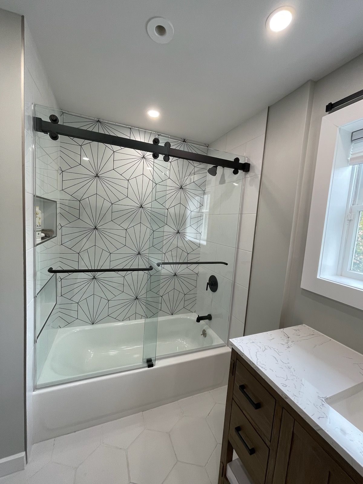 Kids bathroom Upgrade by Cedar Contractors Group, Inc.