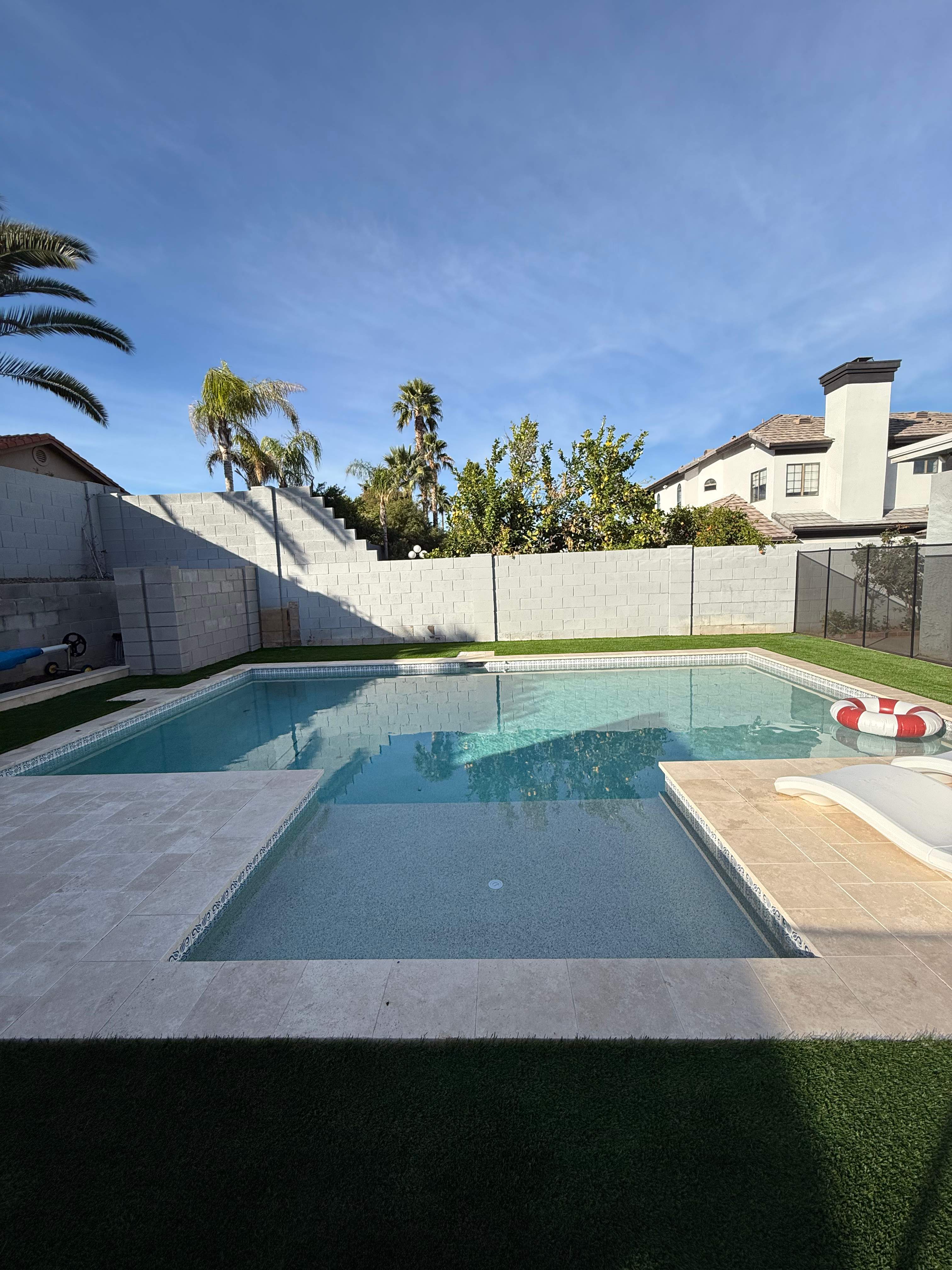 Pool build with baja step and pebble finish by Modern Pools