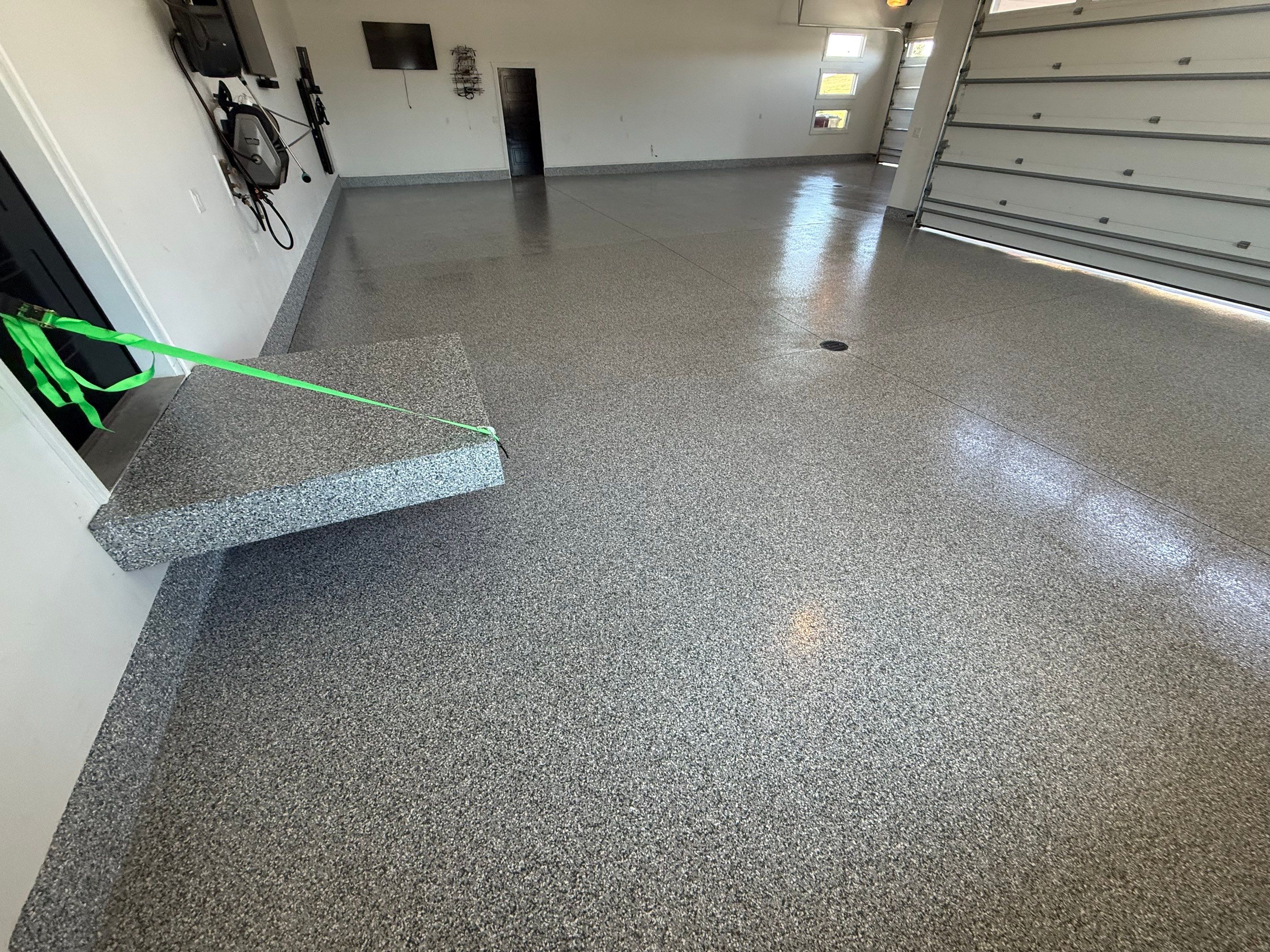 Gravel Flake Garage Floor Coating in Yankton by Select Painting, Coatings & Garage Cabinets