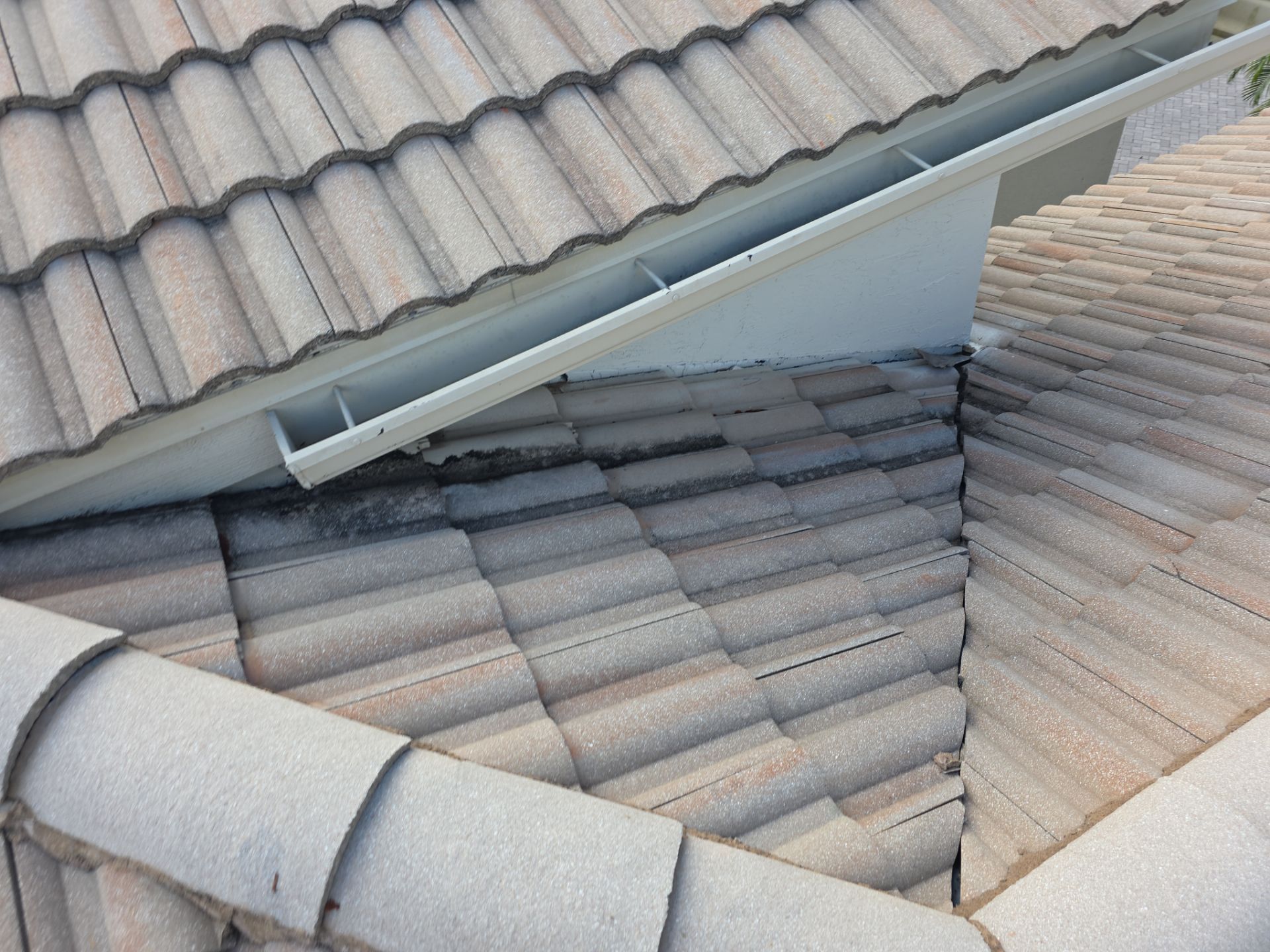 Full Concrete S-Tile Roof Replacement and Deck Repair in Wellington by Aastro Roofing
