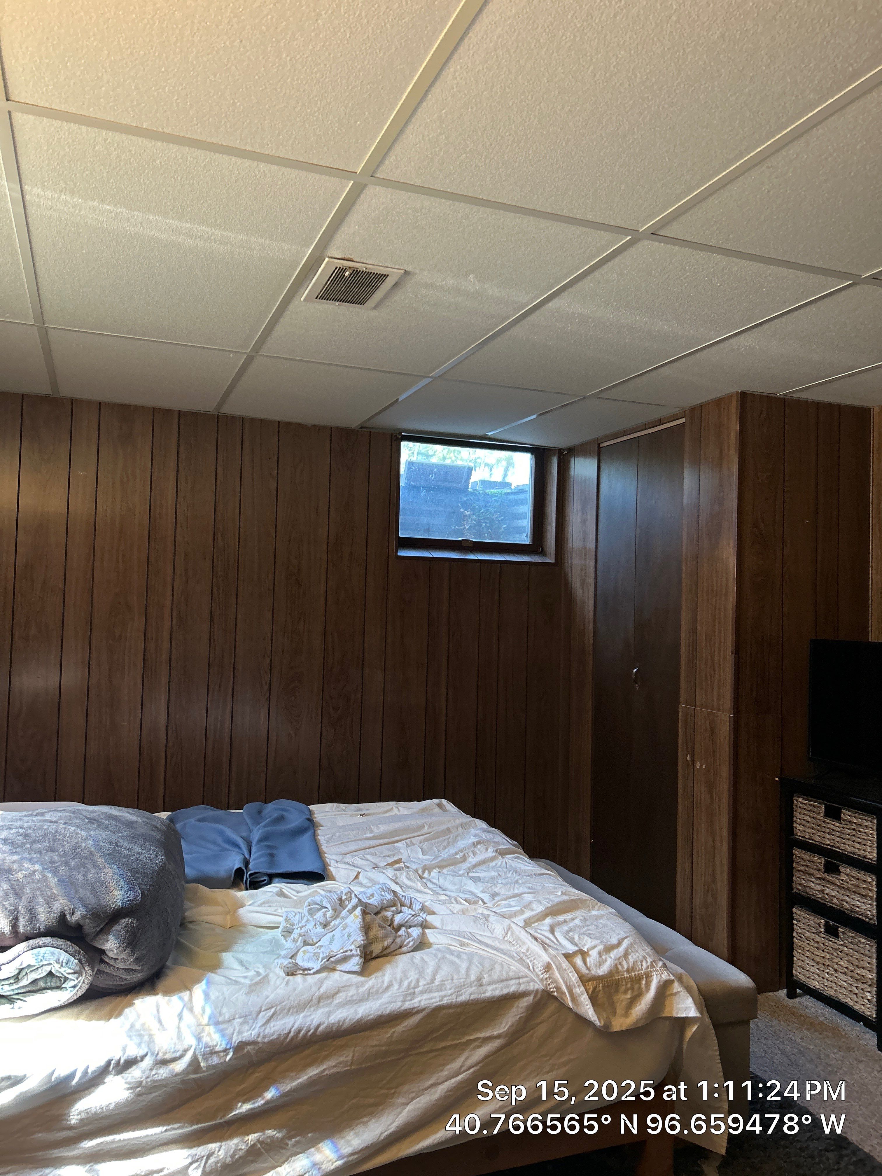 Basement Bedroom Interior Assessment and Ceiling Repair in Lincoln by CompanyCam Sales Demo