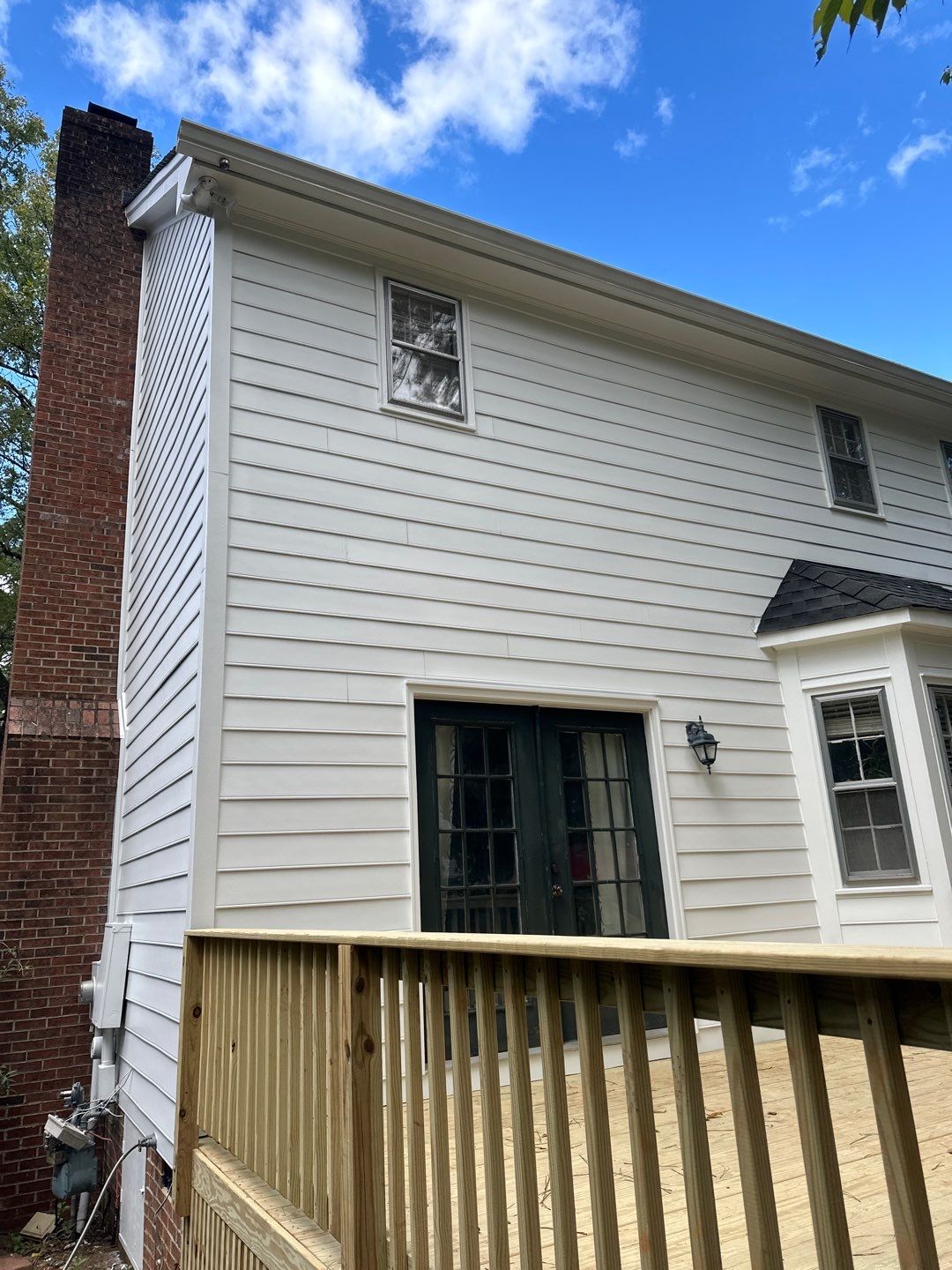 James Hardie Siding Replacement and Custom Deck Construction in Cary by The Remodeling Company
