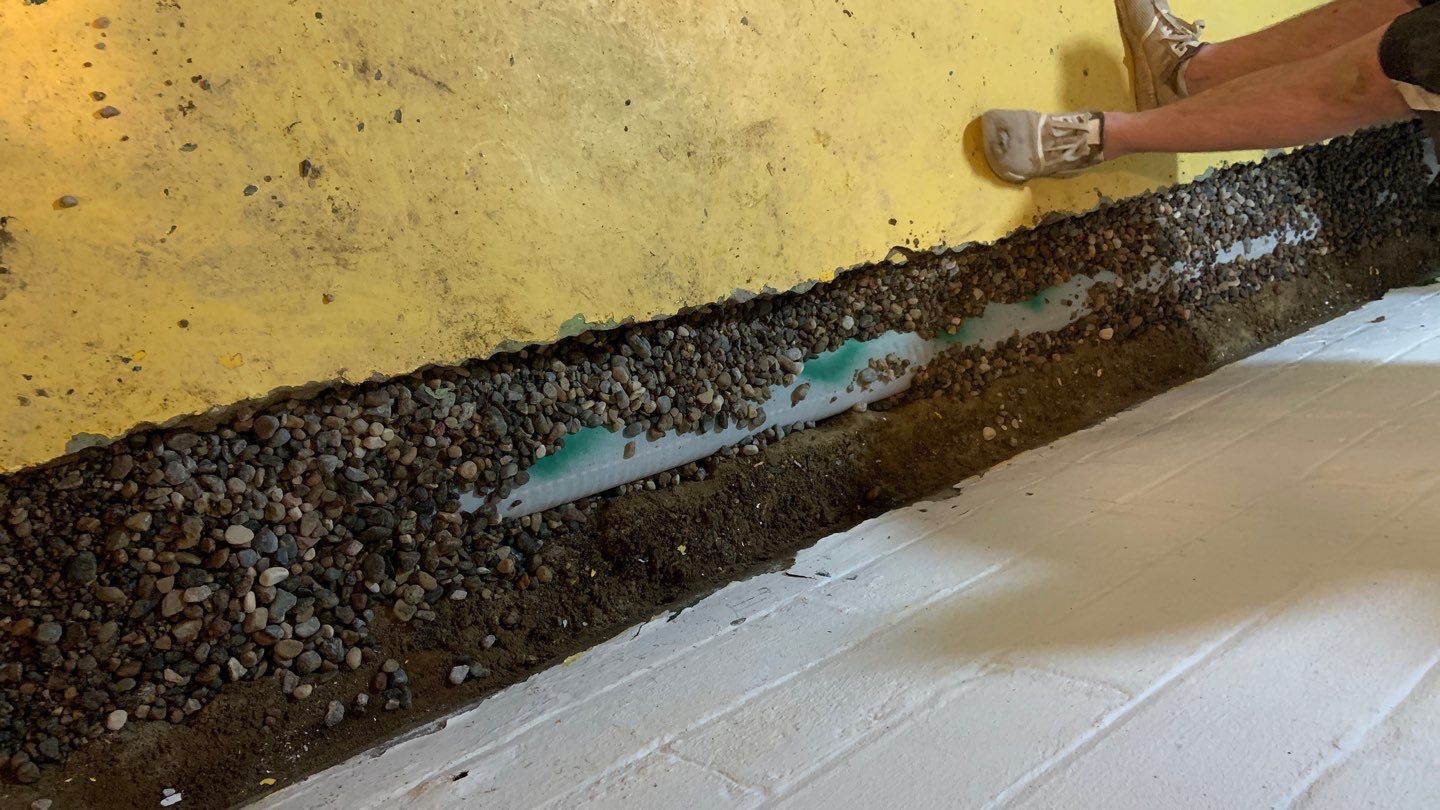 From a Conversation to a Dry Basement for Scott & Jean by Waterproofing Northeast