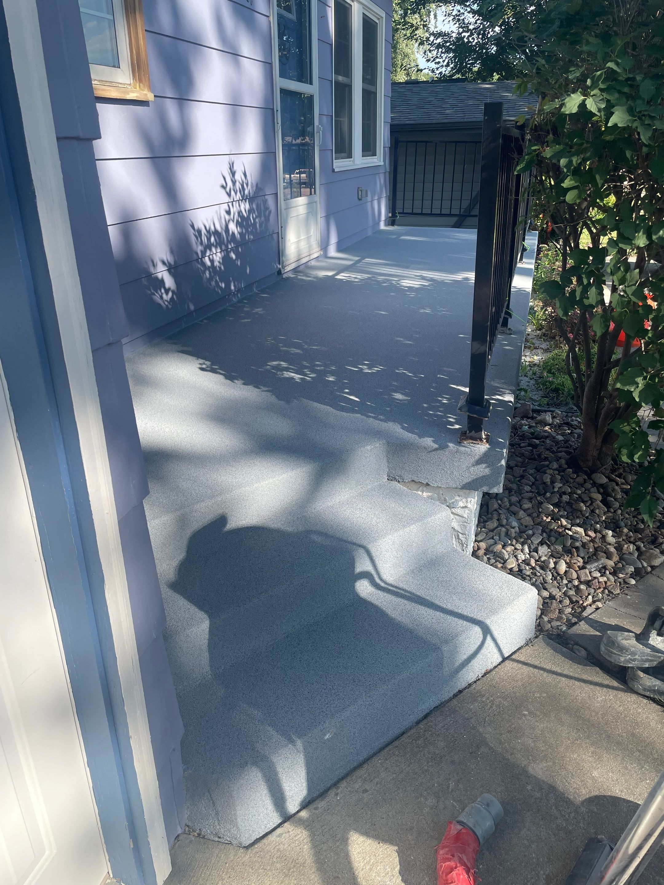 Sioux Falls Concrete Porch Coating with Starry Evening Finish by Select Painting, Coatings & Garage Cabinets