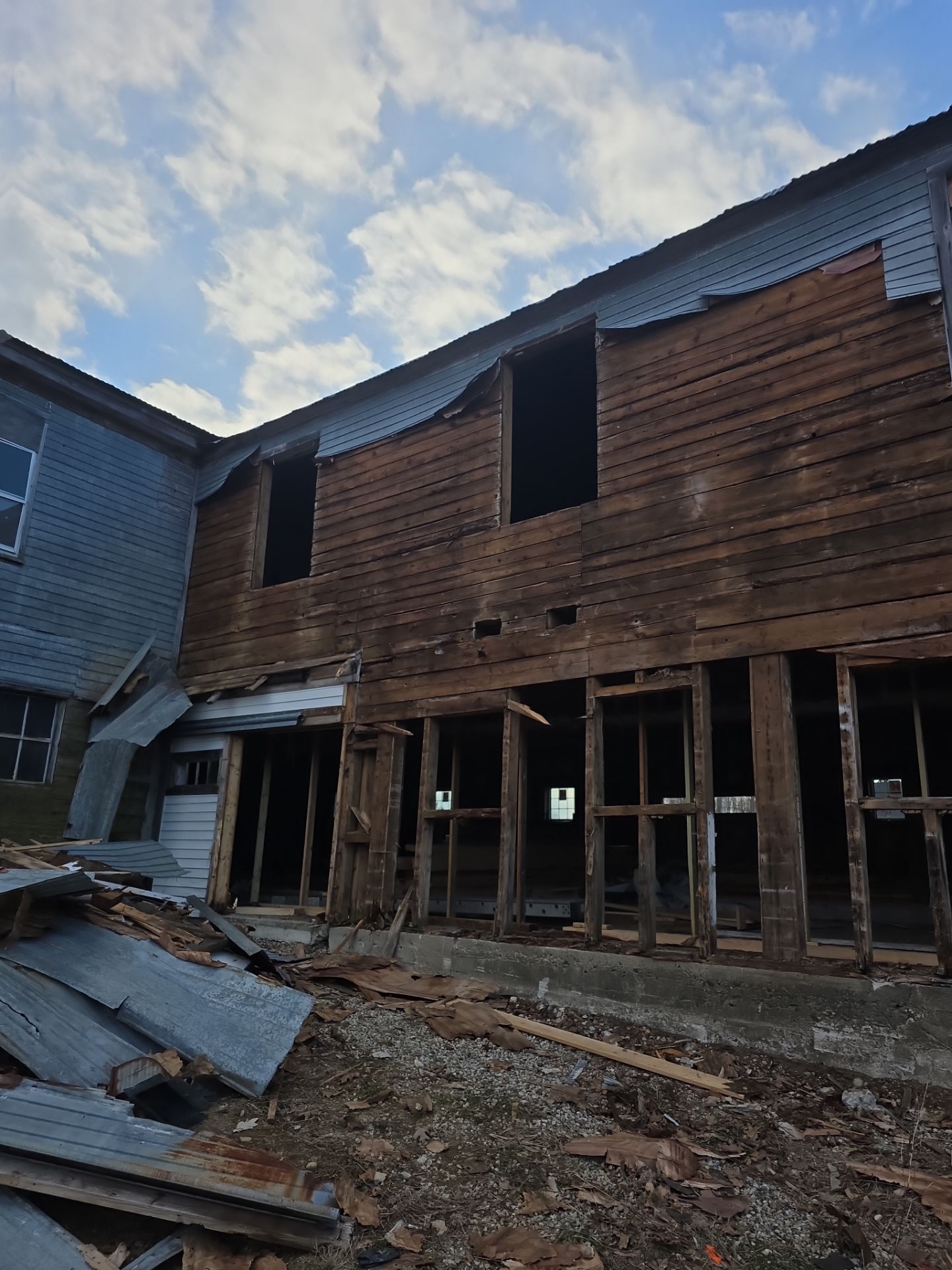 Barn Restoration and Board-and-Batten Siding Installation in Hansons Ridge by B's Roofing & Construction LLC