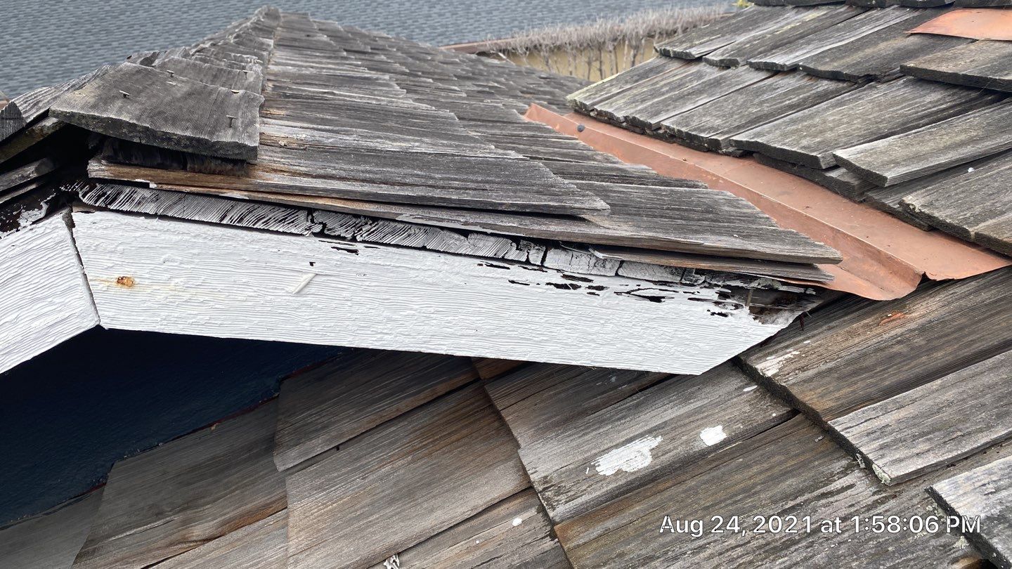 Refurbish and repair shake roof to get ready to sell by Straight Edge Roofing Inc