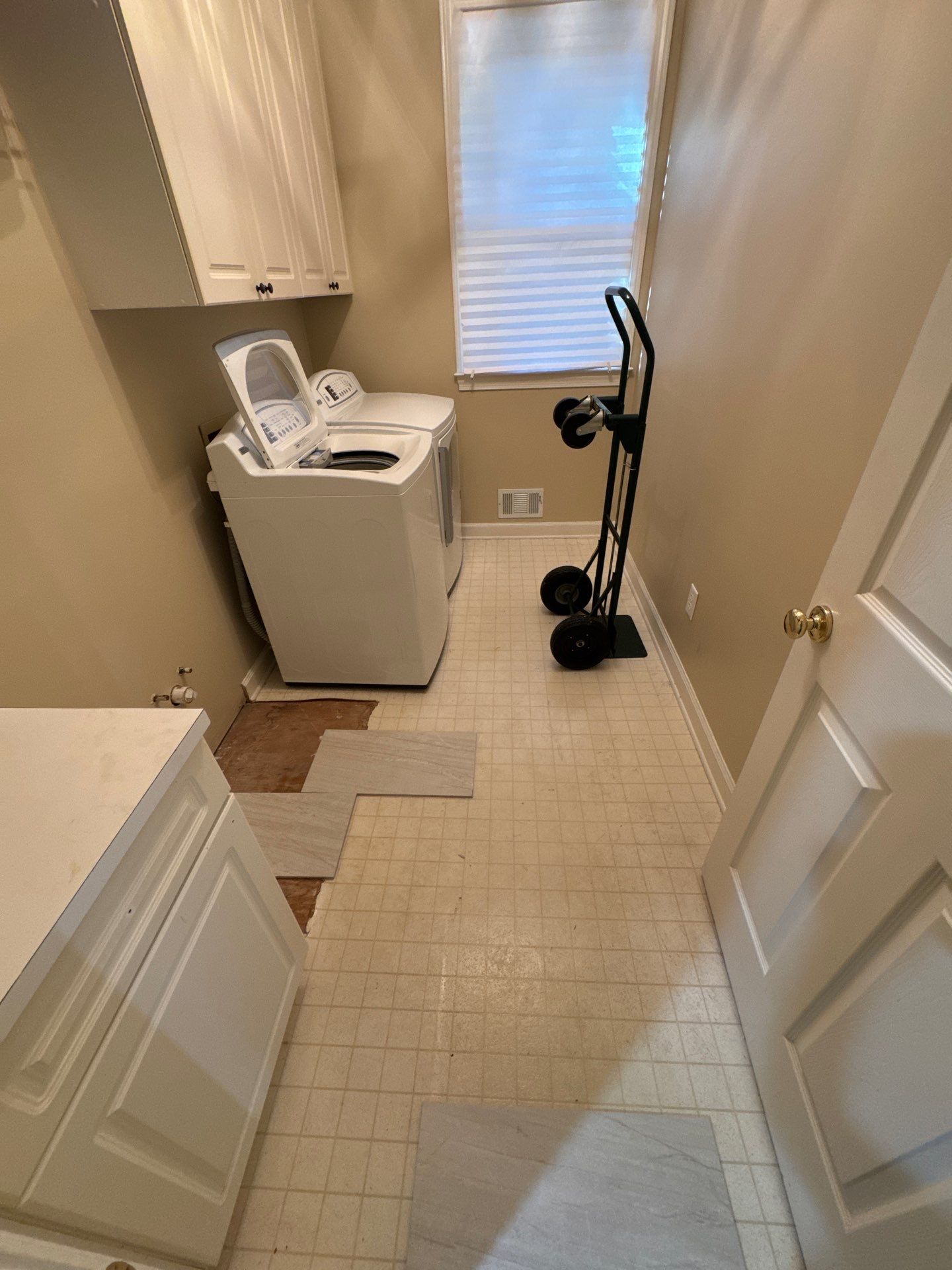 Marietta Bathroom and Laundry Room Floor and Vanity Remodel by Swift Home Renovations