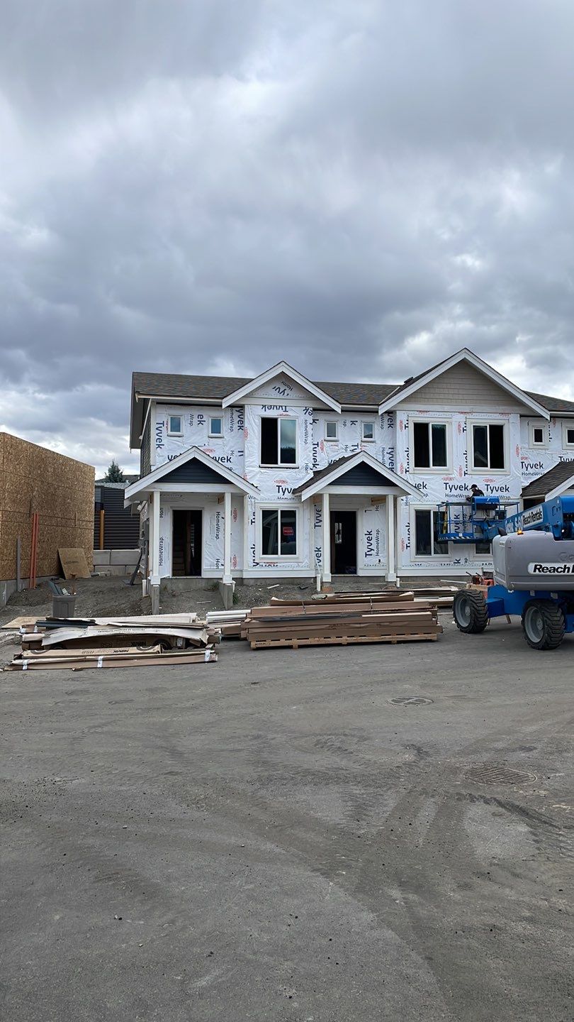 Residential Roofing Installation using OC Driftwood shingles by Top Notch Roofing Inc