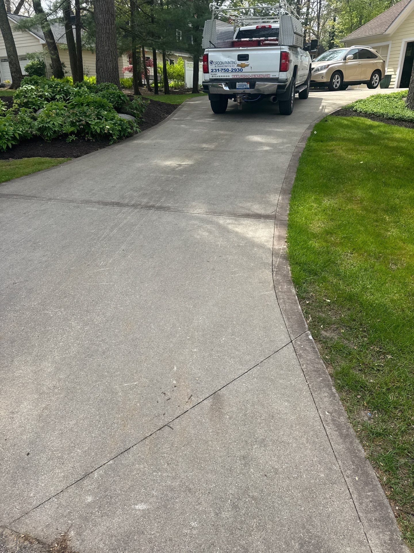 Concrete Driveway and Walkway Staining With Espresso Borders in Grand Rapids by Gordon Painting