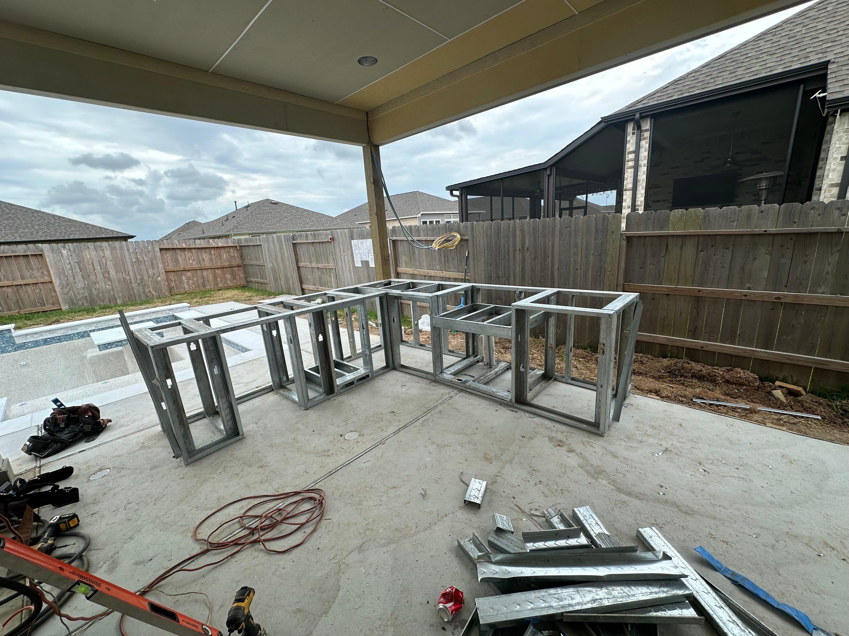 Patio and Summer Kitchen in Texas city by SophAlx LLC