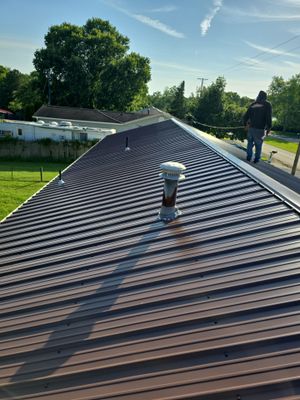 Residential Roofing Installation using Metal