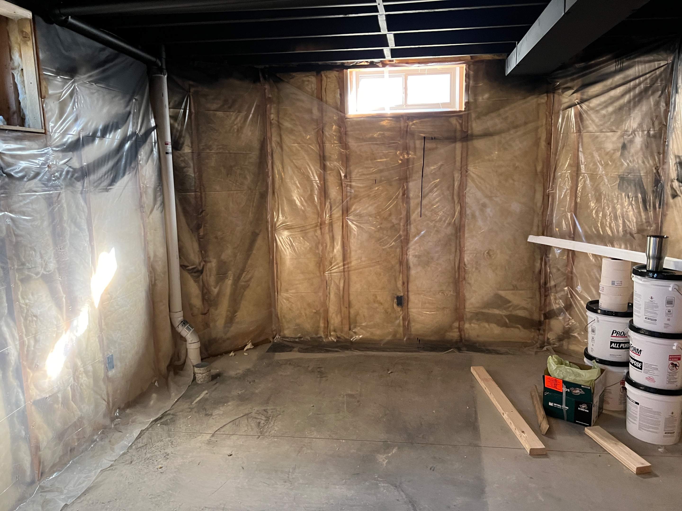 Basement Remodel w/ LVP Flooring & Exposed Ceiling by Chagnon Building & Remodeling LLC