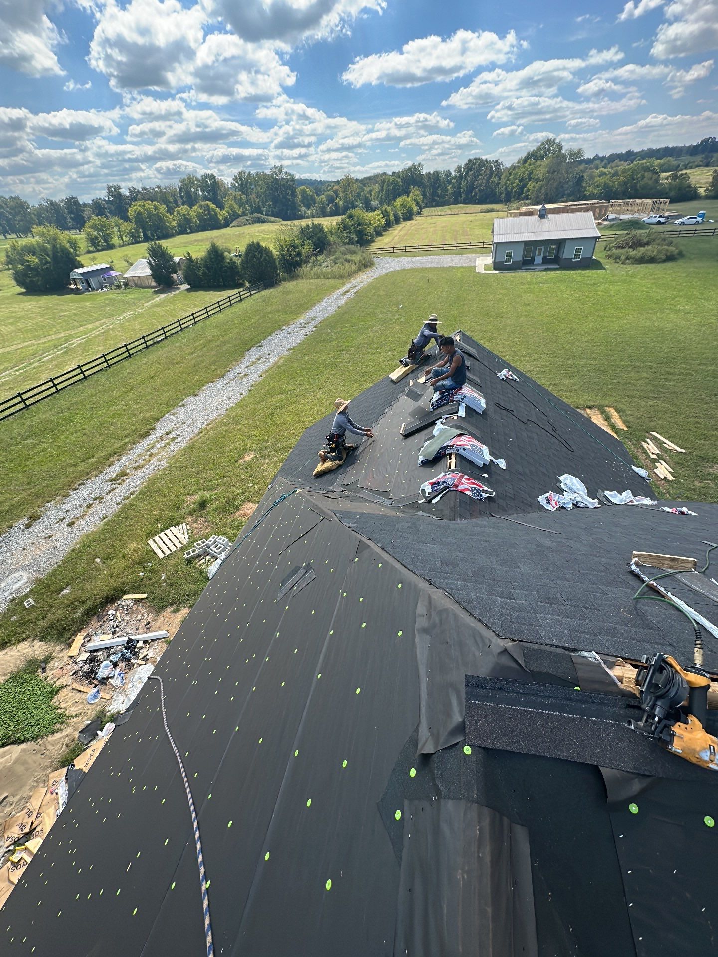 Residential Roofing Installation using Tamko Heritage AR with Standing Seam Metal Porch by Undersun Roofing 