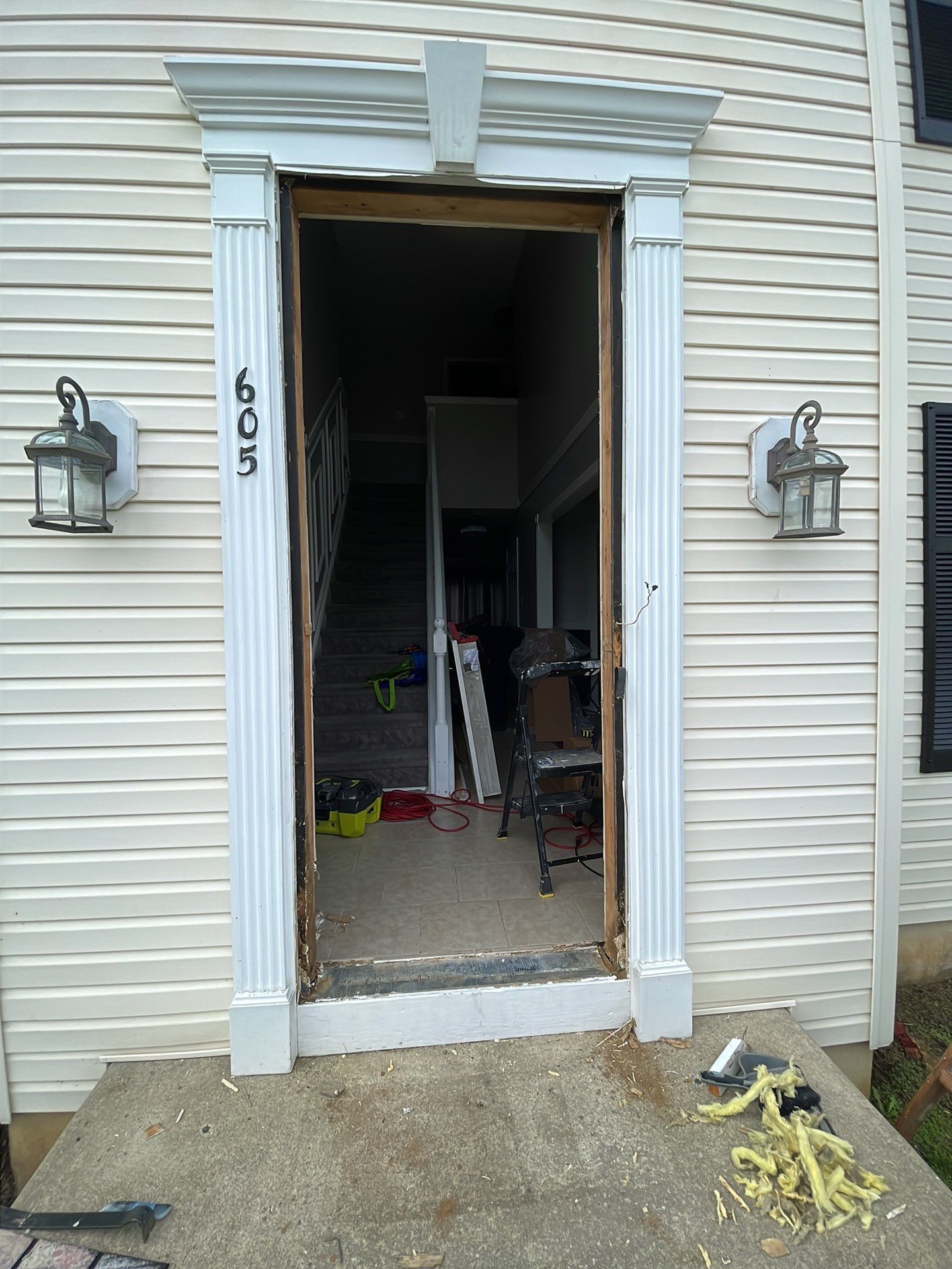 Exterior Installation using Transom Window & Door by A1 NERDY HOMES LLC