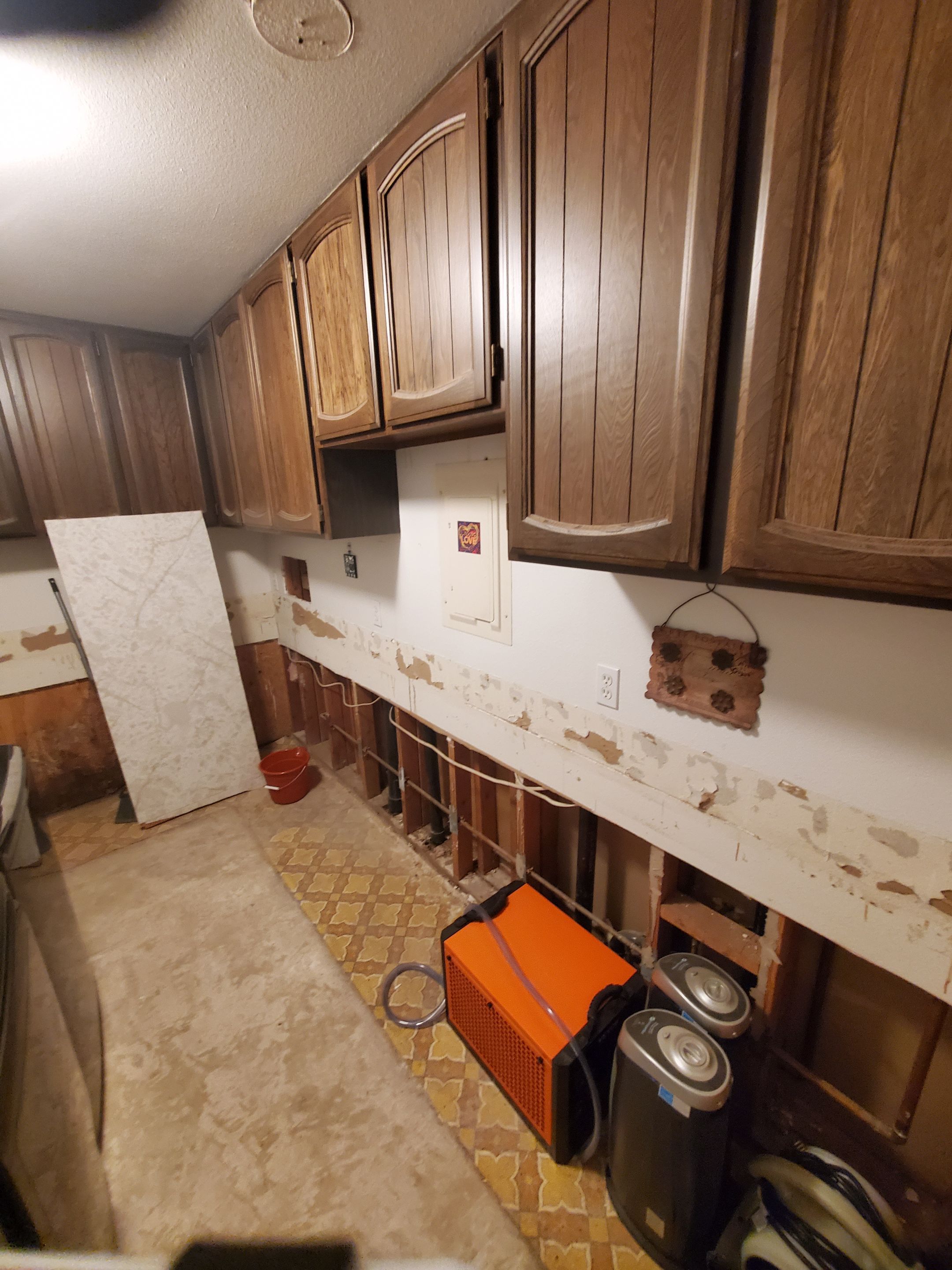 Water Damage using Air Movers by Construction Now LLC