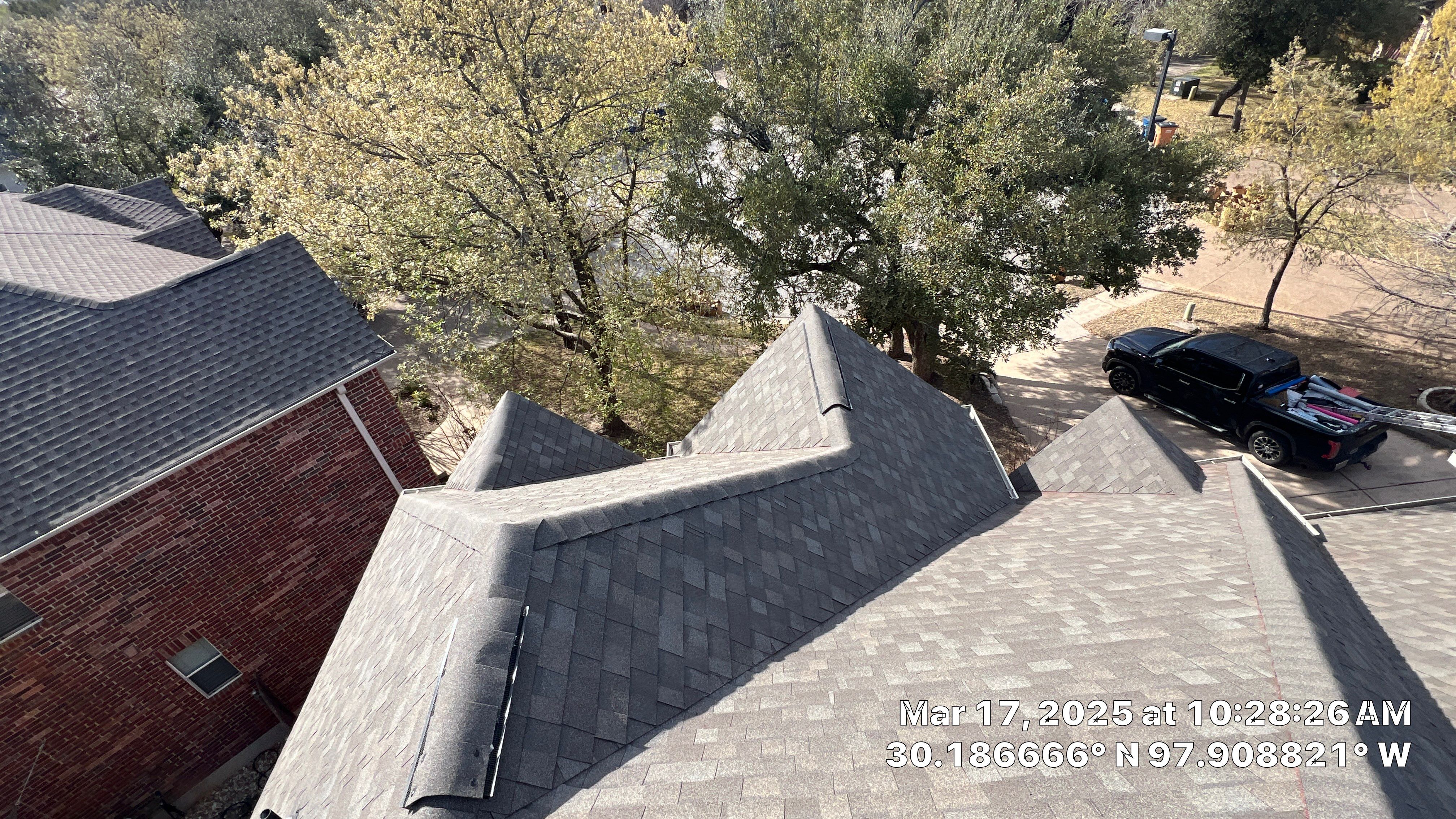 Asphalt Shingle Roof Replacement and Storm Damage Restoration in Austin by Caliber Restoration LLC