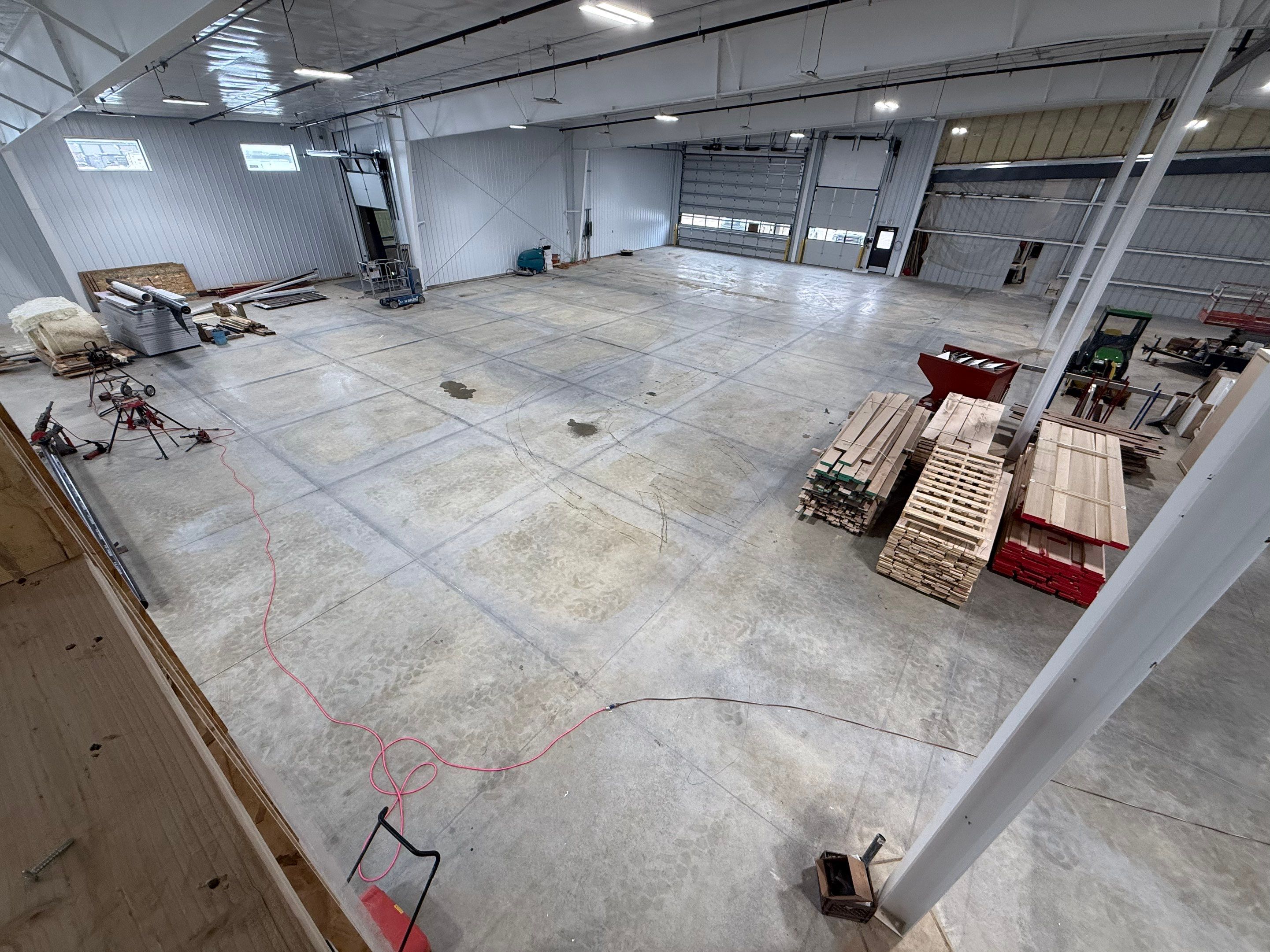 Industrial Concrete Polishing and Coating for Large Manufacturing Warehouse by Select Painting, Coatings & Garage Cabinets