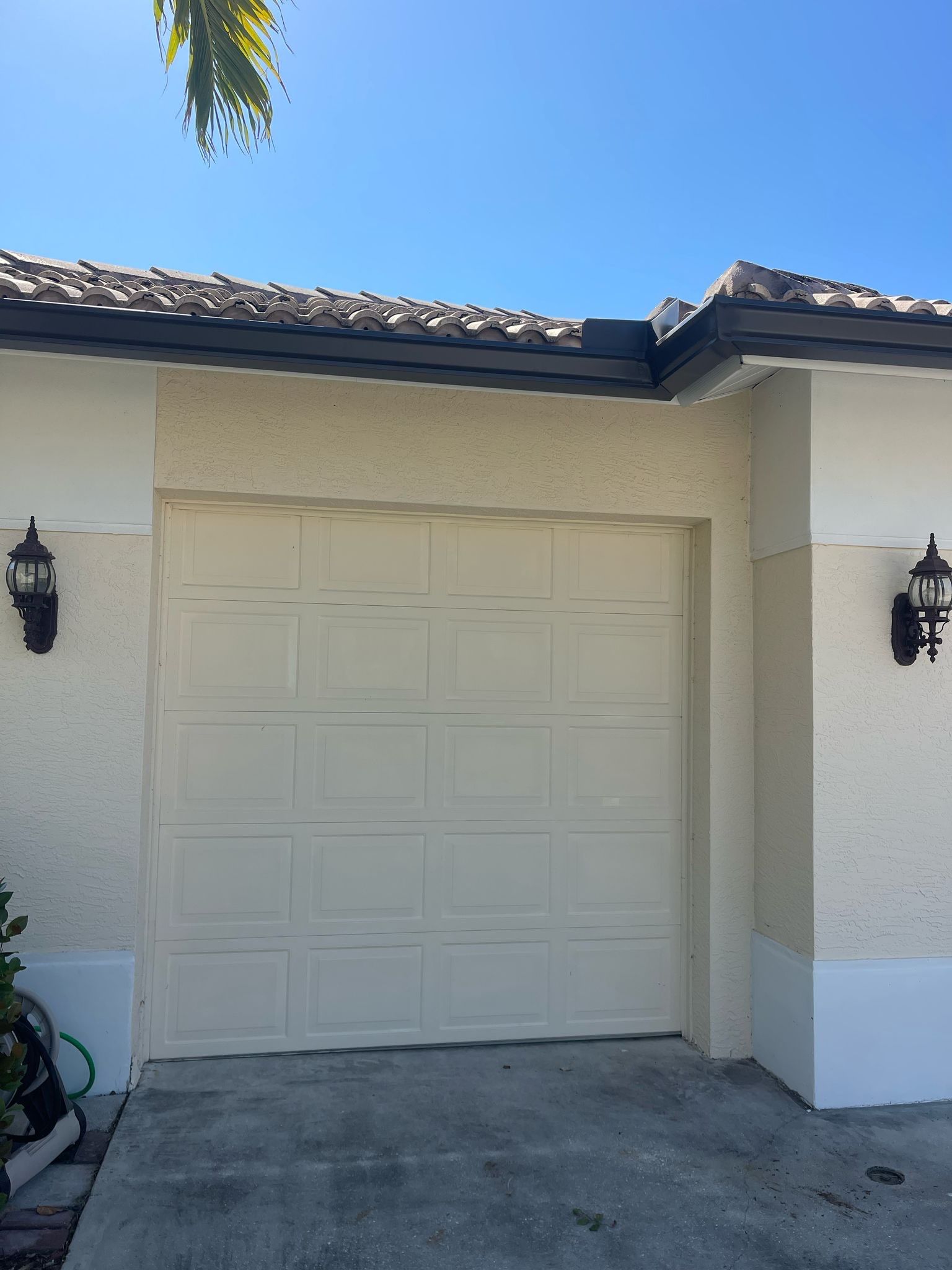 Bronze Seamless Gutters using 3X4 Elbow Downspout in Bonita Springs FL by Gutter Professors