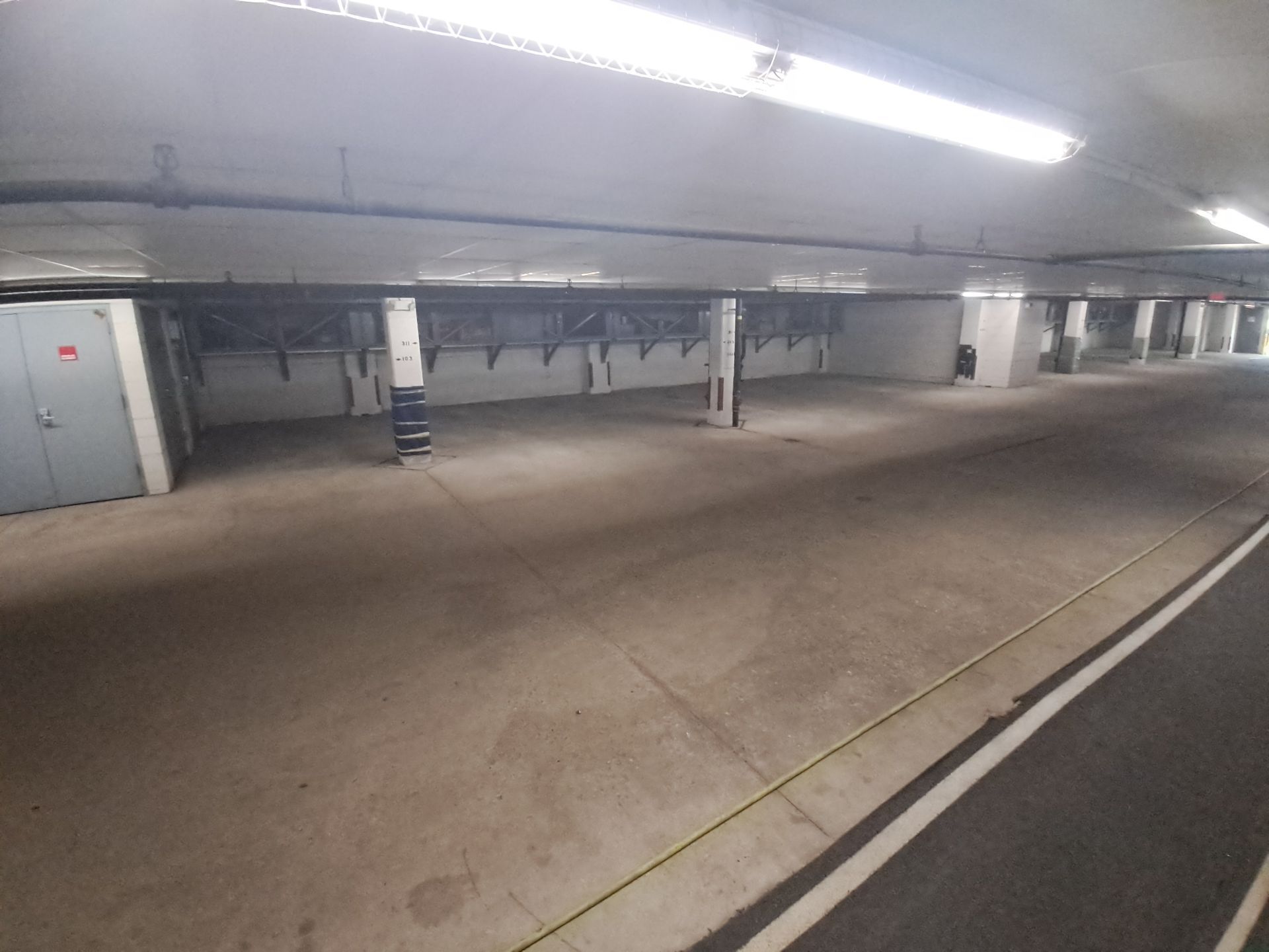 Parking Garage Sweeping & Concrete Deep Cleaning by Northern Power Washing LLC.