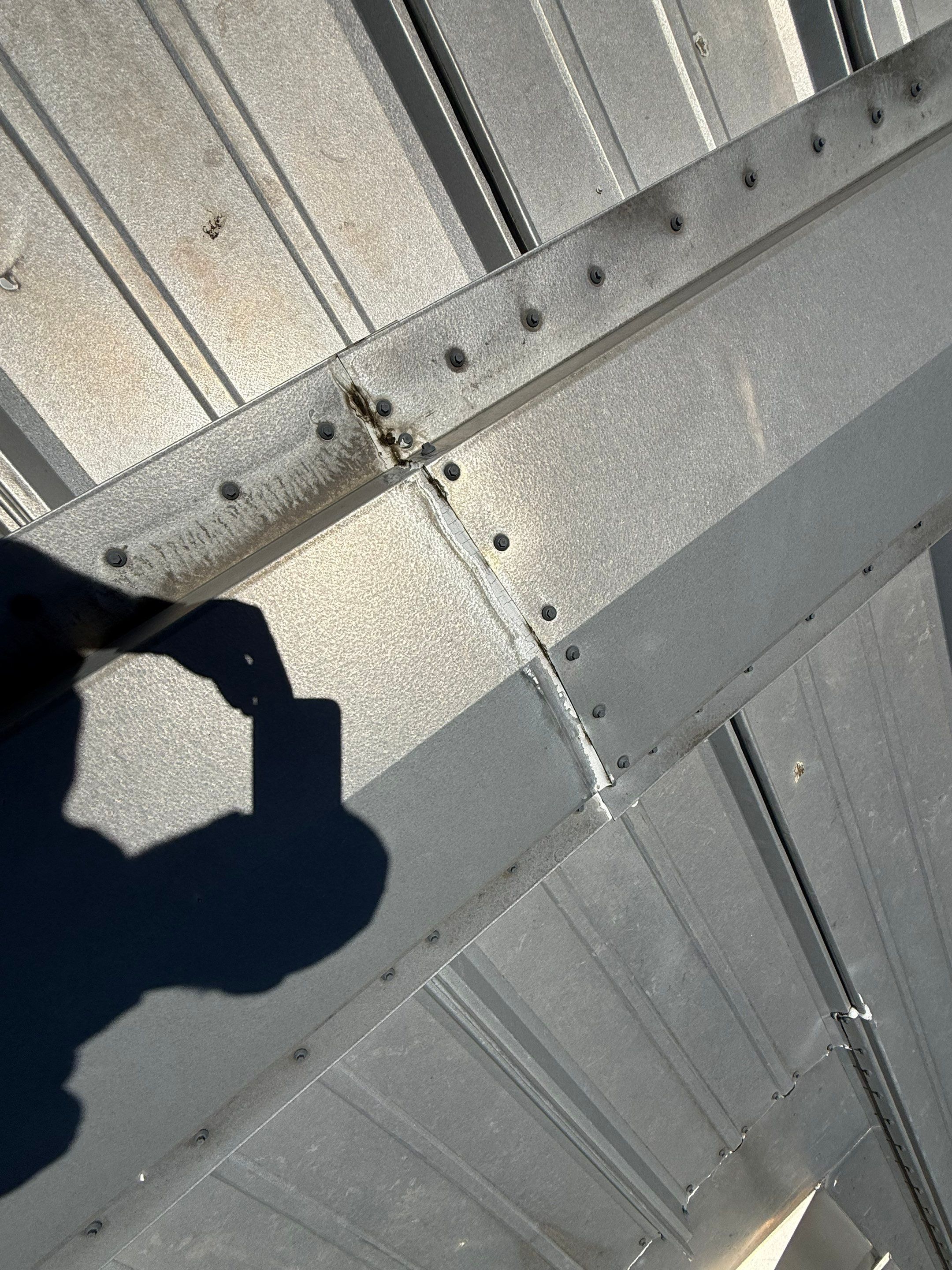 Commercial Metal Roof Repair and Skylight Sealing in West Memphis by Revival Roofing Services