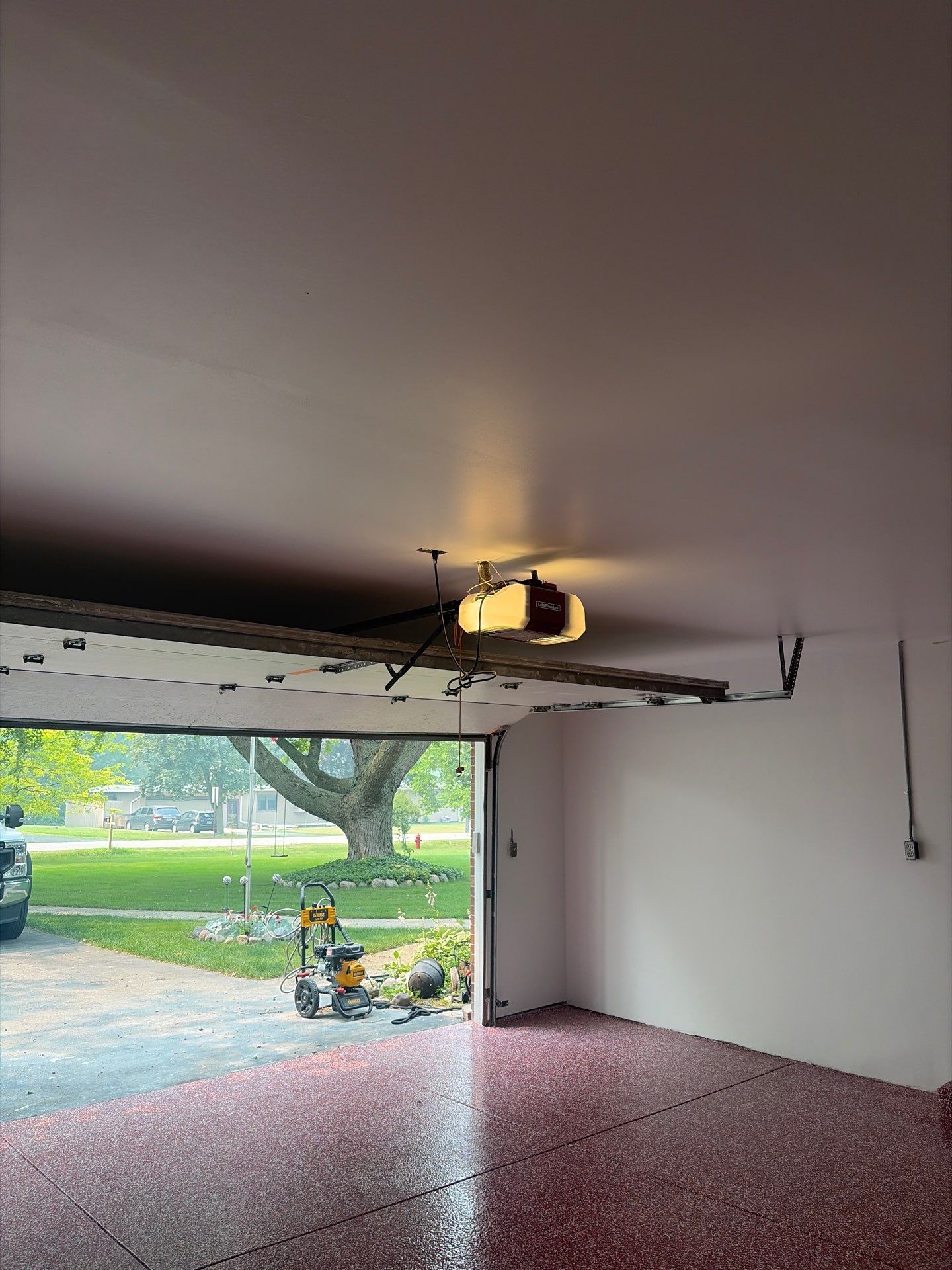 Bayside Garage Interior Remodel with Custom Epoxy Floor Coating by OCS Contracting Services
