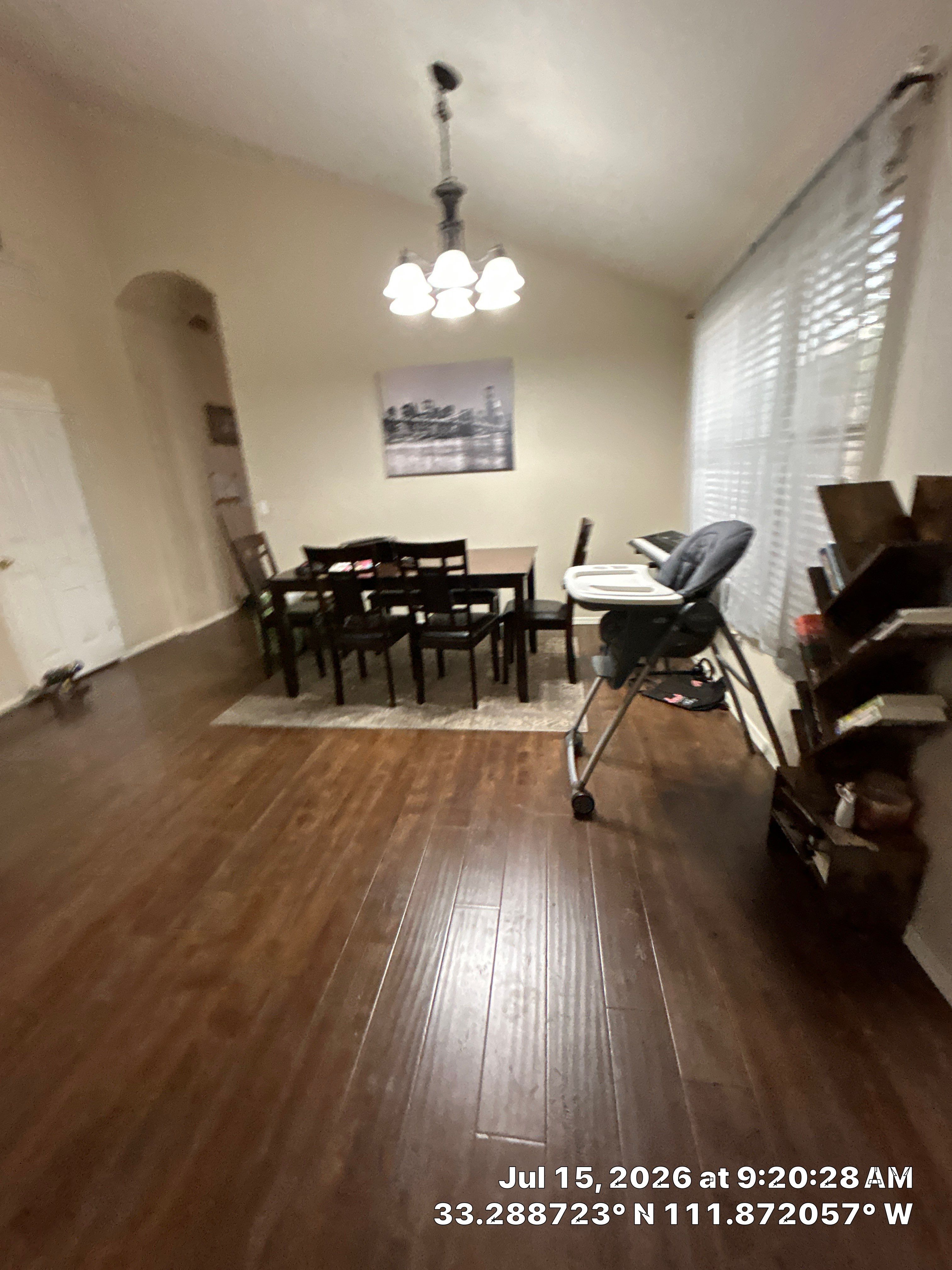 Dark Wood Laminate Flooring Installation for Chandler Dining Room by CompanyCam Sales Demo
