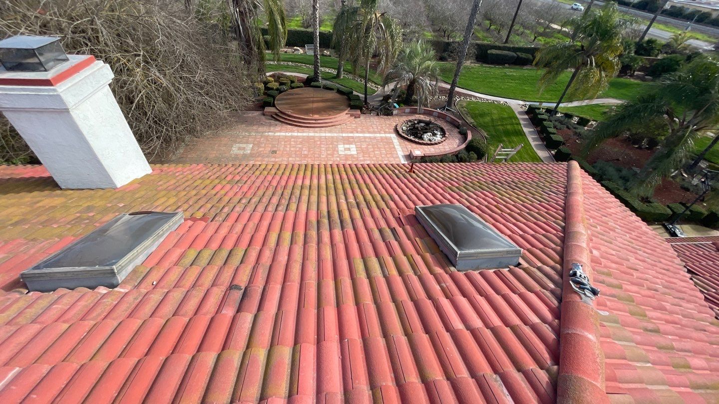 Tile refurbish project using existing tiles and replaced underlayment and battens by Straight Edge Roofing Inc