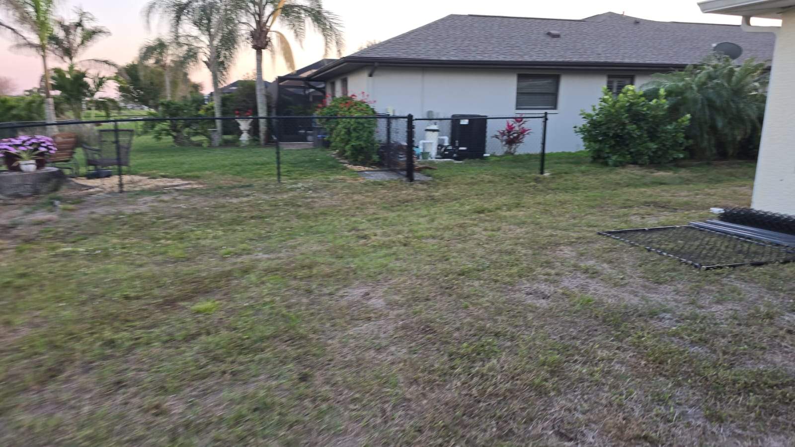 Waterfront Black Chain Link Fence Installation in Rotonda West by True Fence LLC