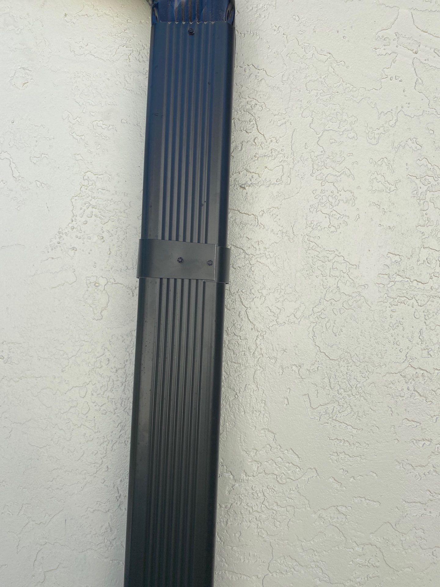Black Seamless Gutters for Modern Homes in Punta Gorda by Gutter Professors
