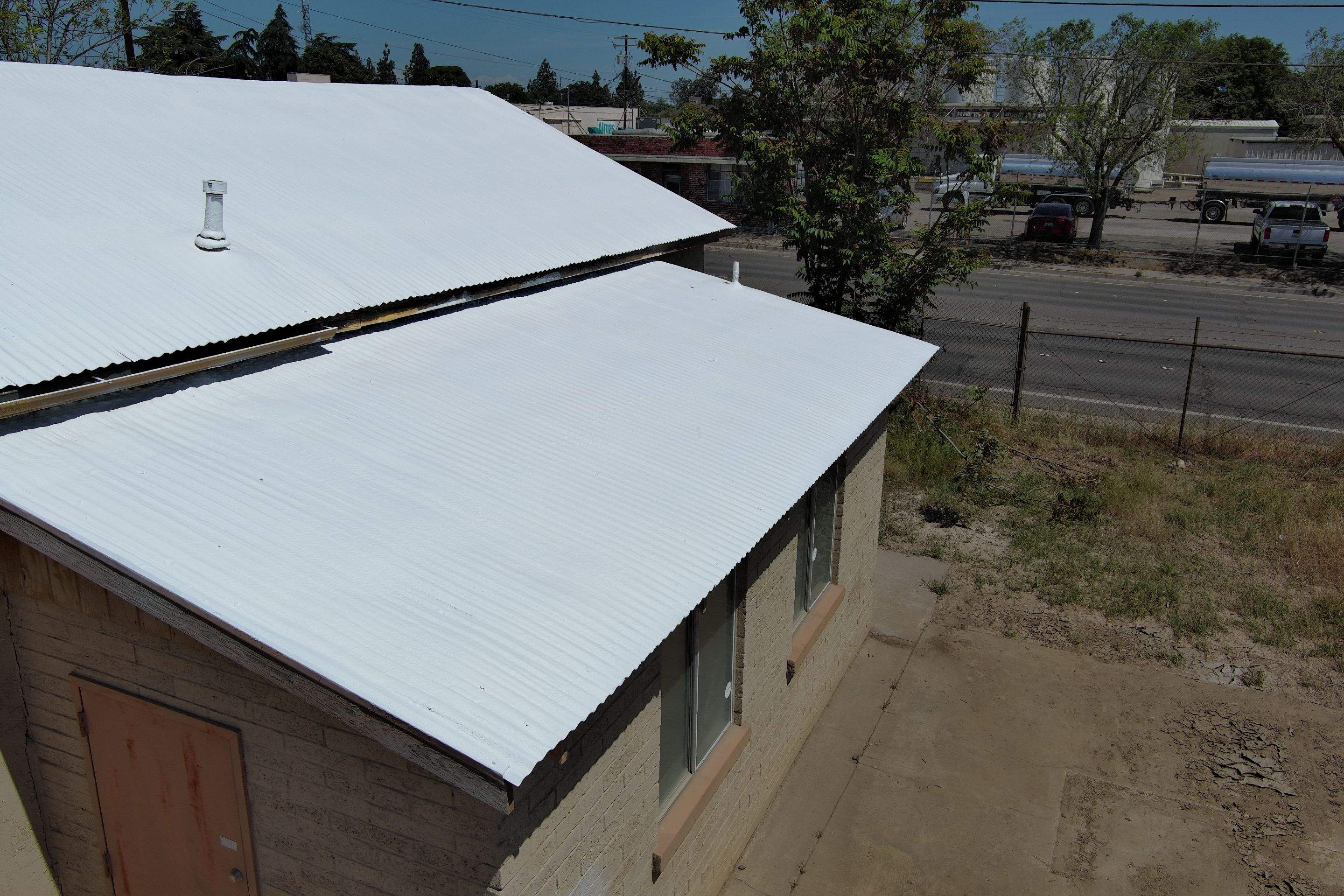 Spray foam and coatings using Conklin Benchmark/PUMA XL by Straight Edge Roofing Inc