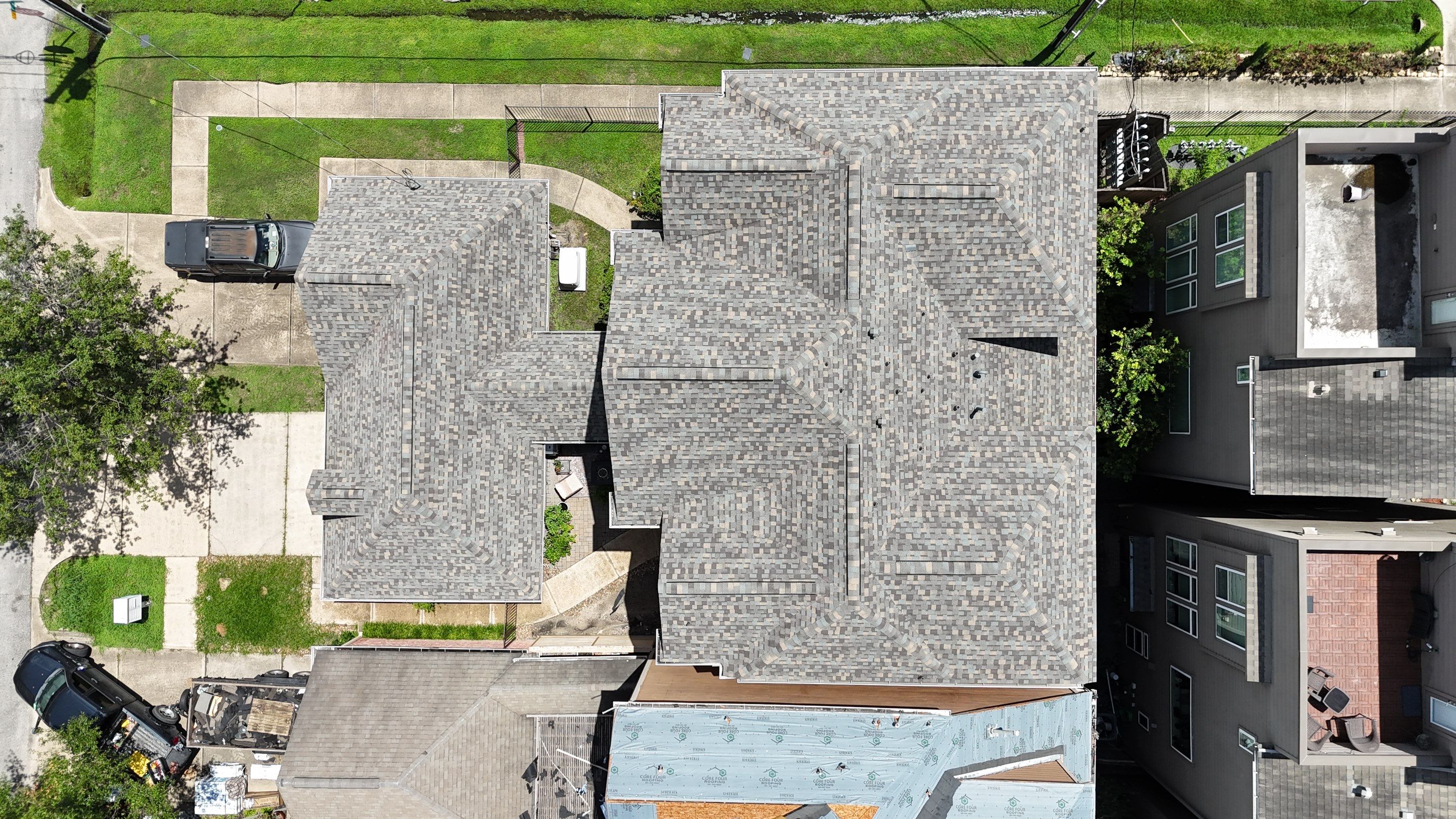Residential Roofing Installation on a Highrise Duplex using IKO Dynasty by Core Four Roofing