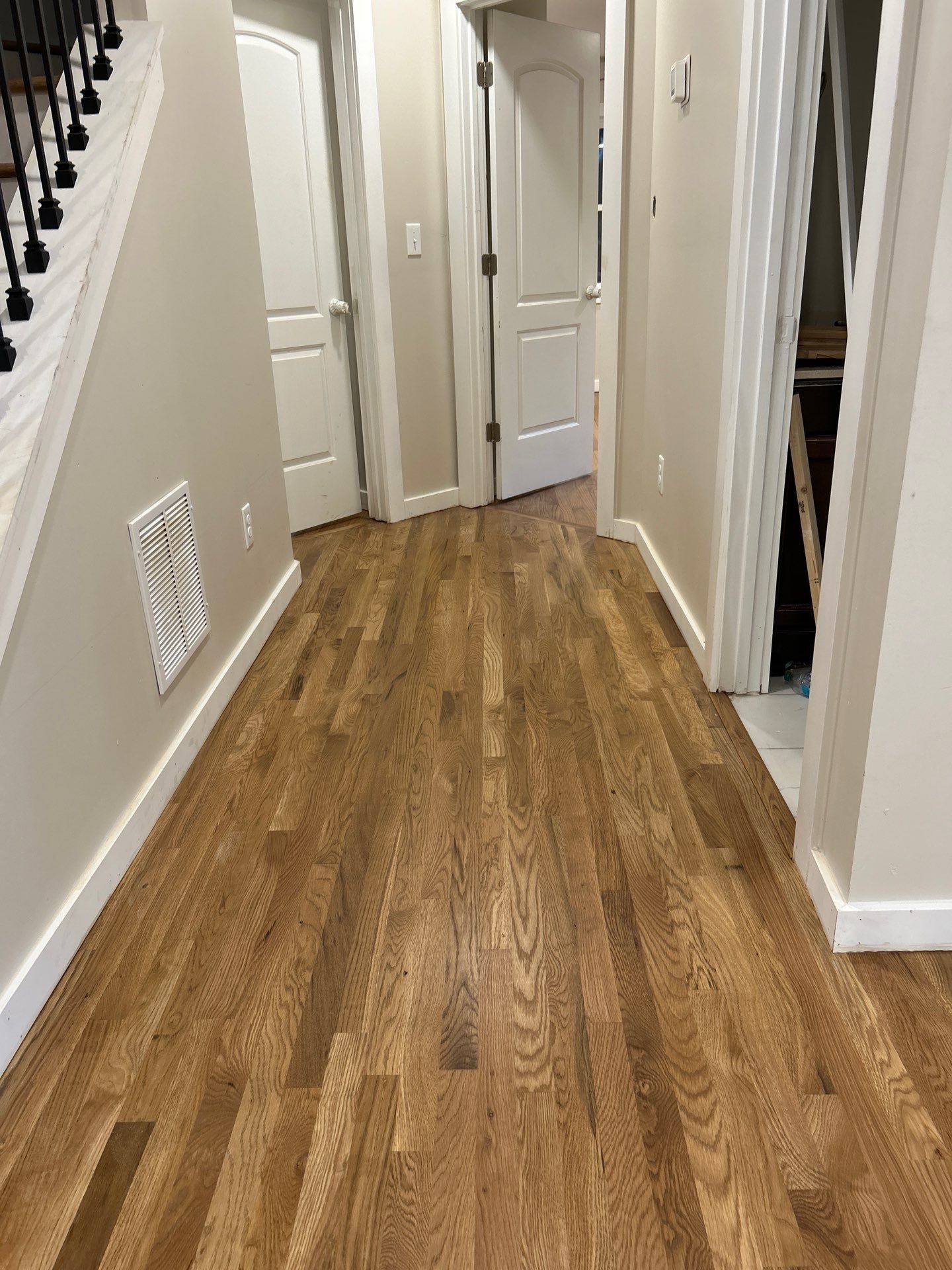 Remodel with existing and new white oak by Footprints Floors of East Atlanta