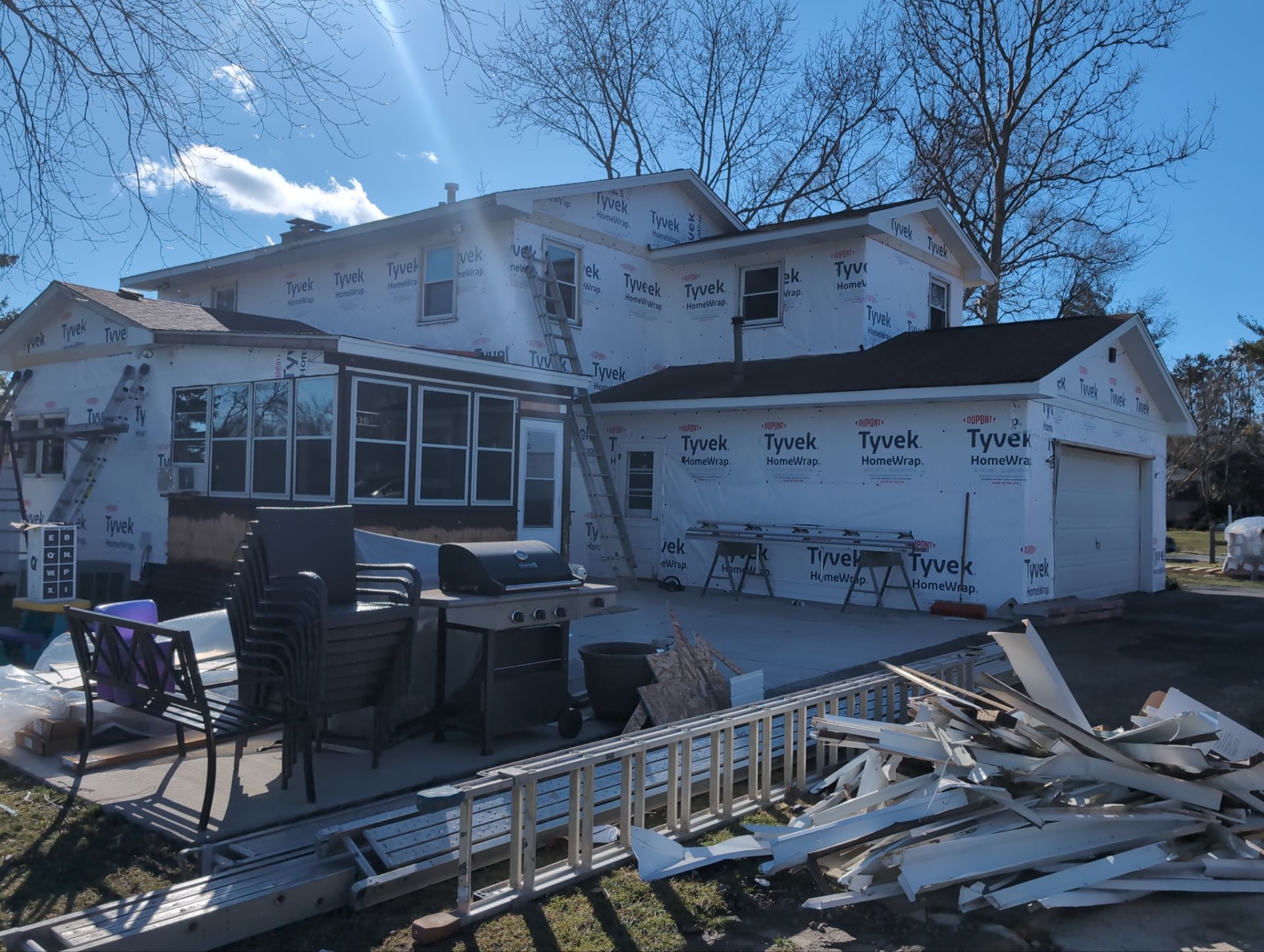 Vinyl siding replacement using CertainTeed Monogram double 5" vinyl siding  by AJ Exteriors & Roofing Inc.