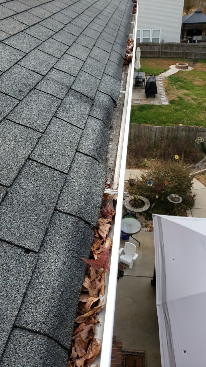 gutters and Driveway by Power Wash Masters LLC