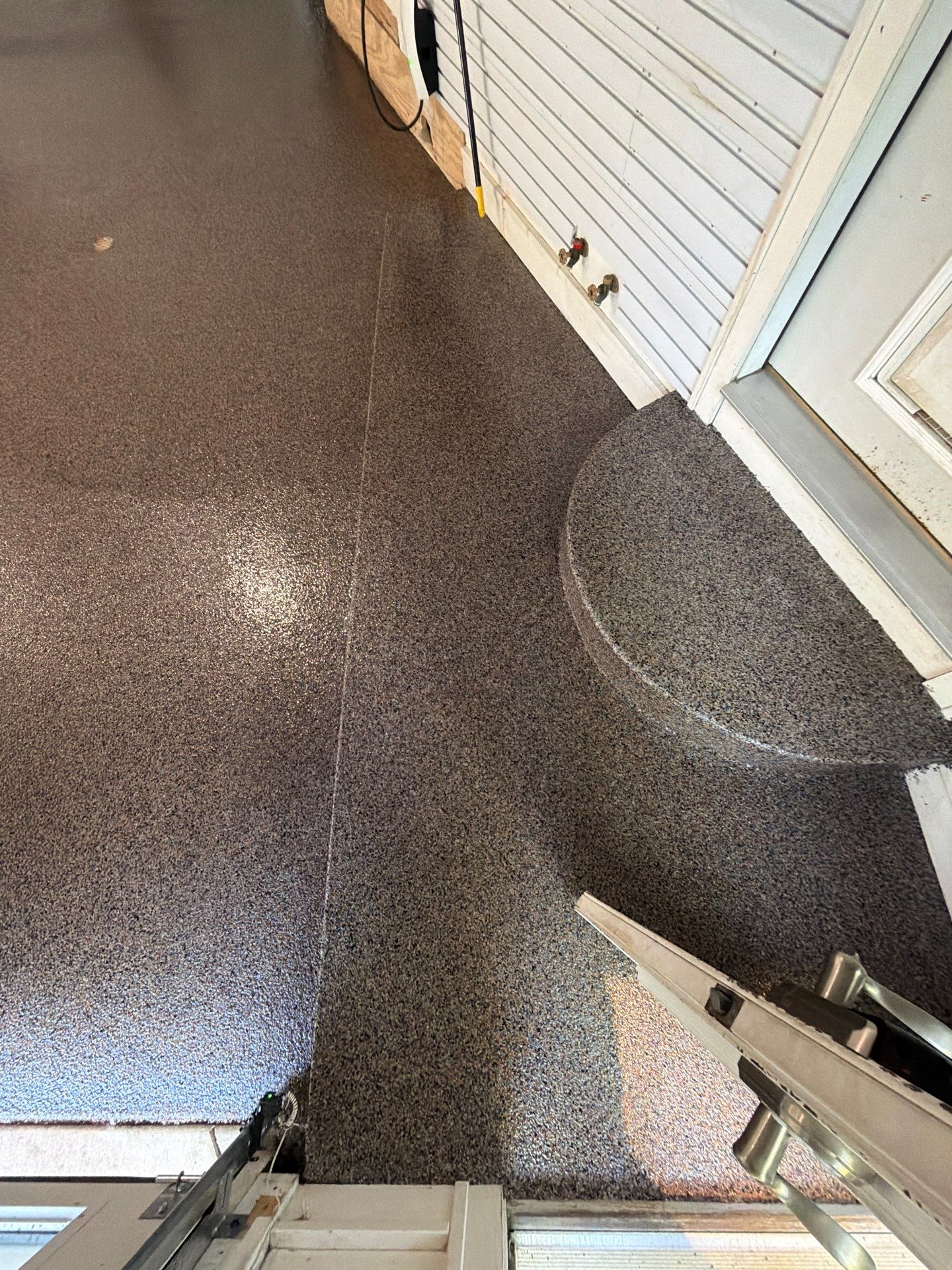 Residential Garage Epoxy Flake Floor Installation in Grand Haven by Gordon Painting