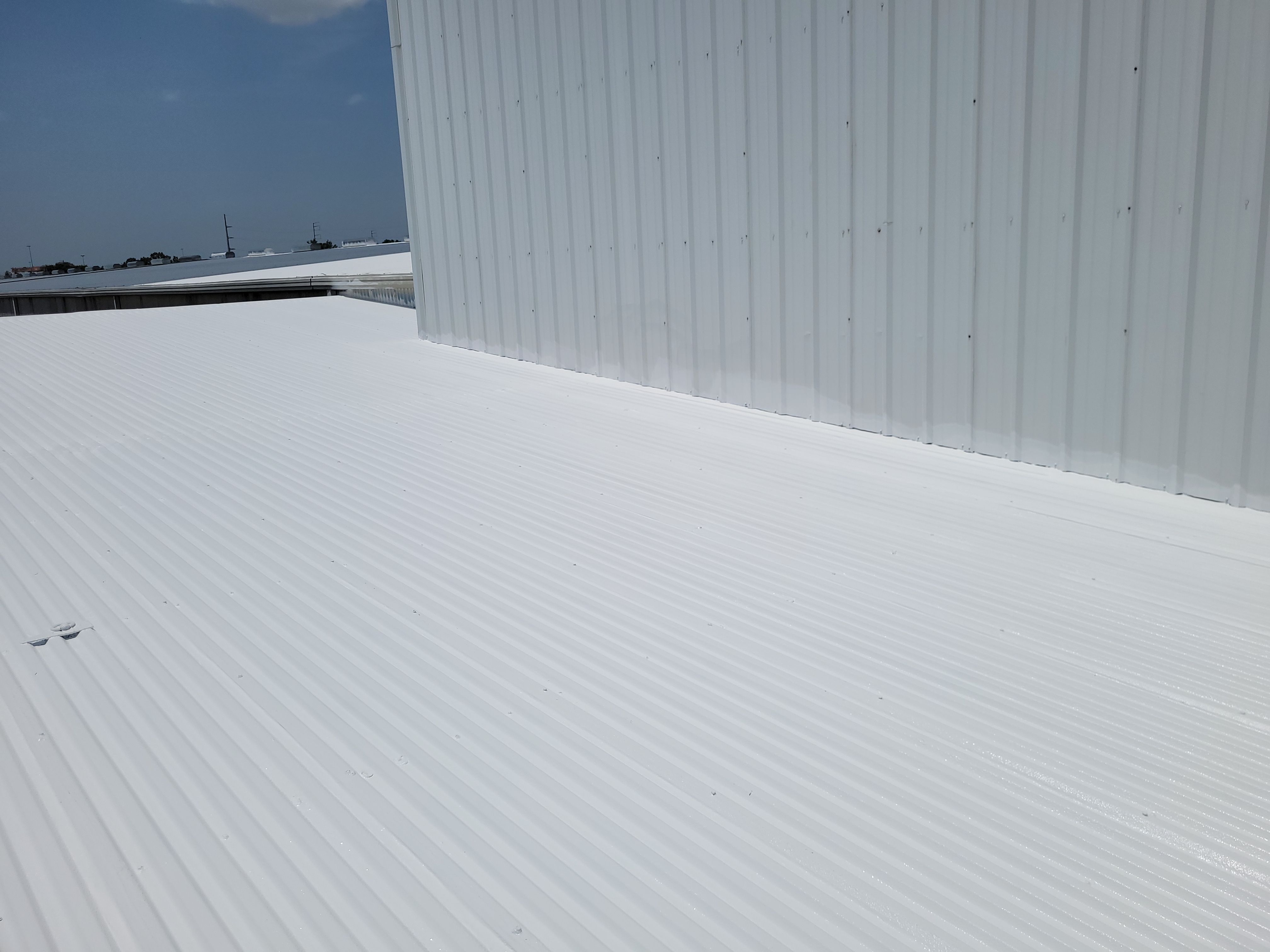 Commercial Metal Restoration System using Aldocoat Coatings by Hostetler Roofing