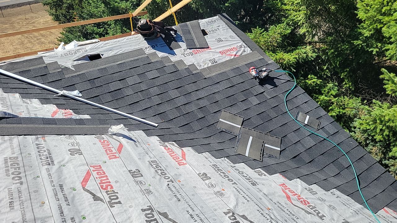 Residential Roofing Installation using IKO Dynasty (Color: Granite Black) by Orezona Building & Roofing Company, Inc.