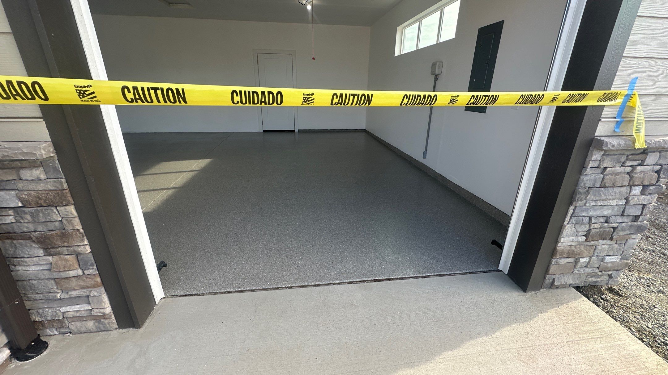 Garage Transformation using Travertine by Croc Coatings, LLC