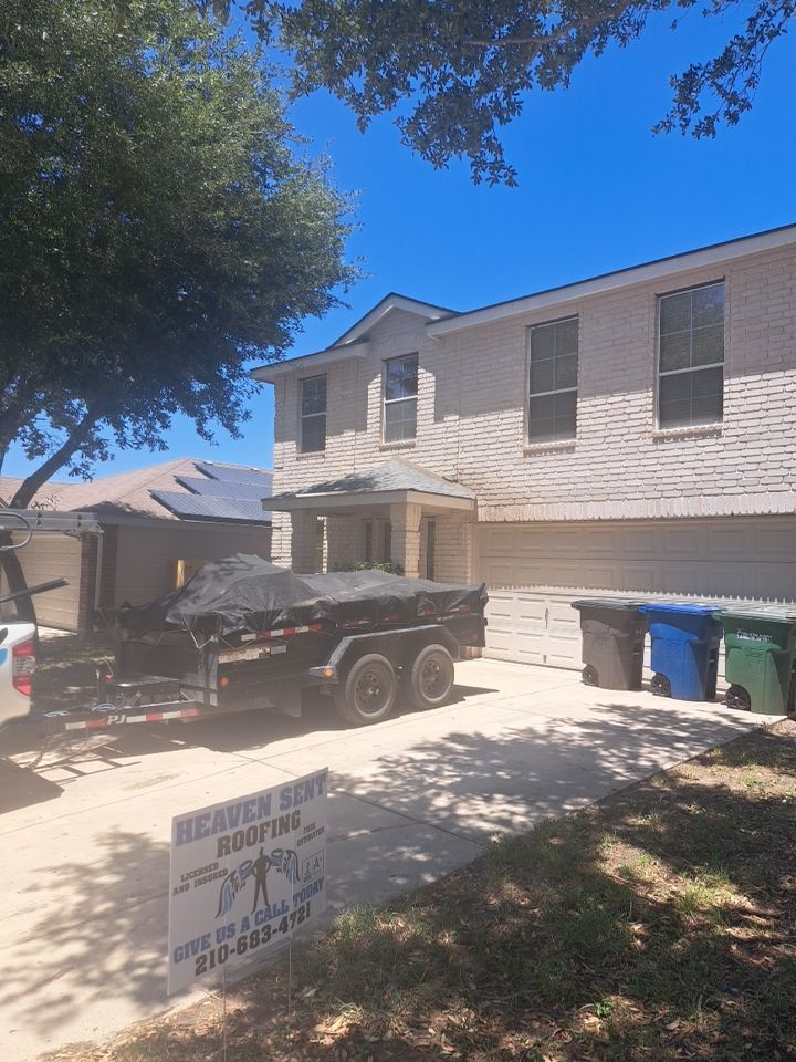 Reroof w/ window repairs by Heaven Sent Roofing, LLC 