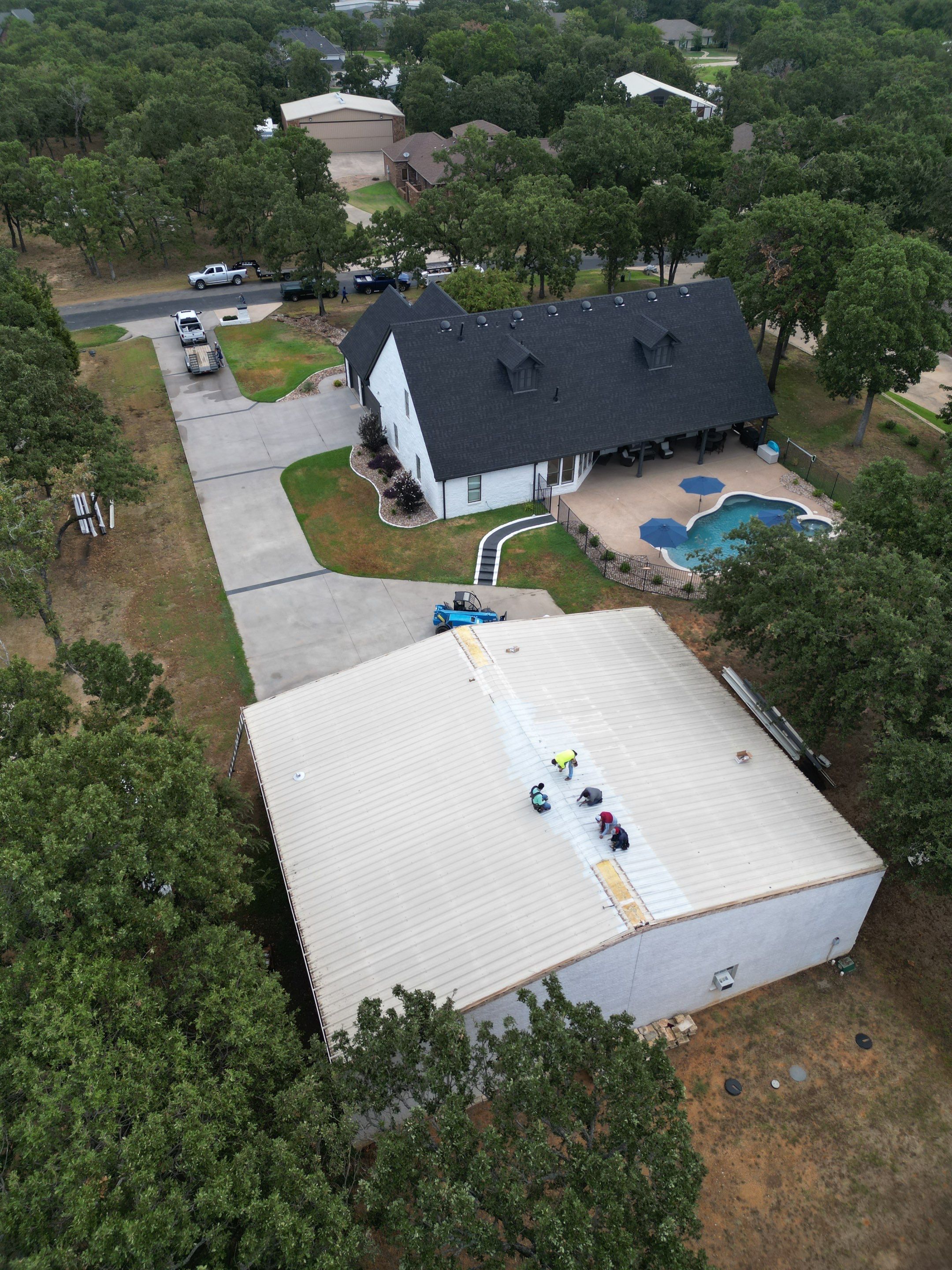 R-Panel Replacement by First Out Roofing 